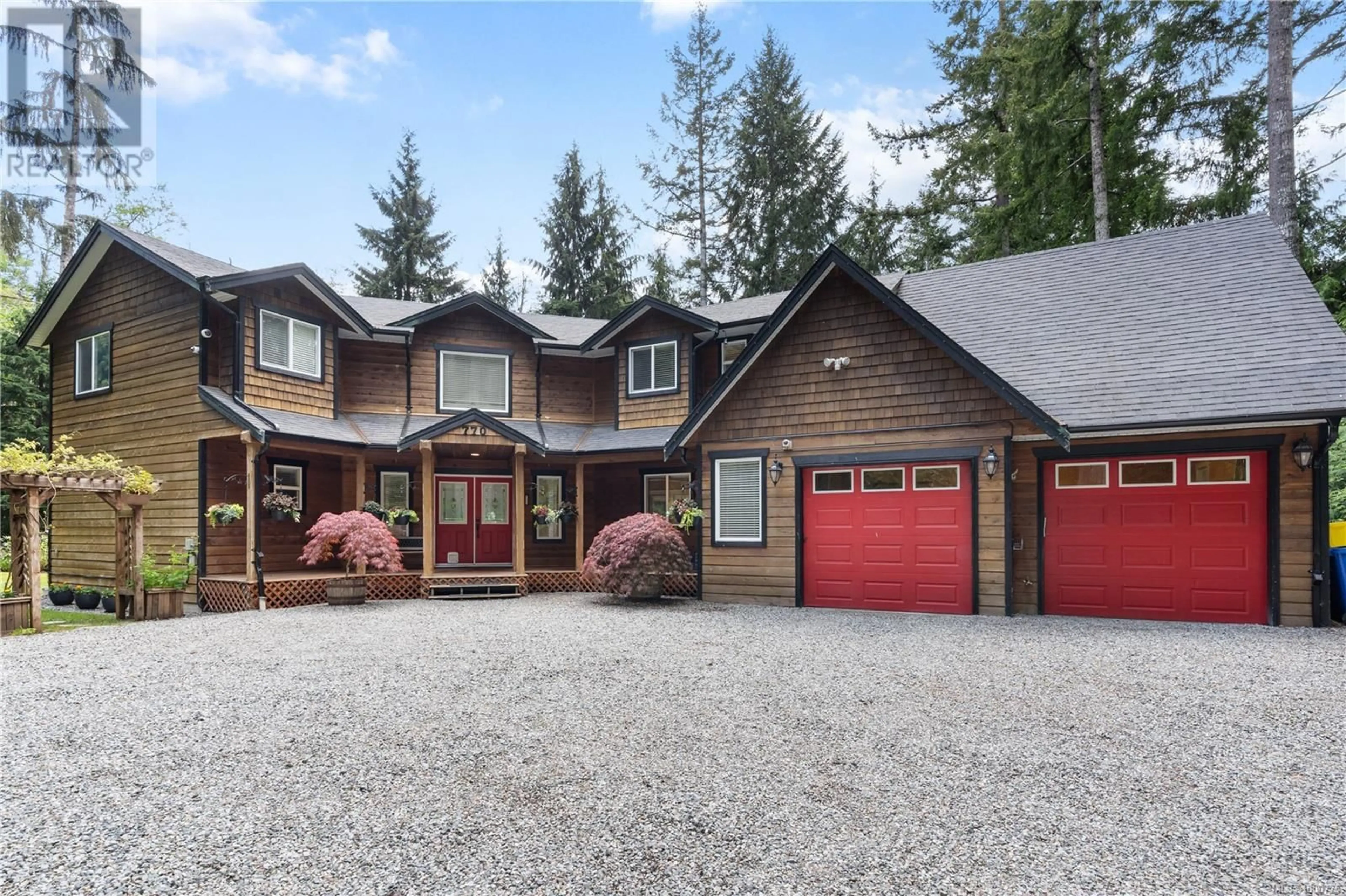 Home with vinyl exterior material, street for 770 SHAWNIGAN LAKE ROAD, Shawnigan Lake British Columbia V8H2J1
