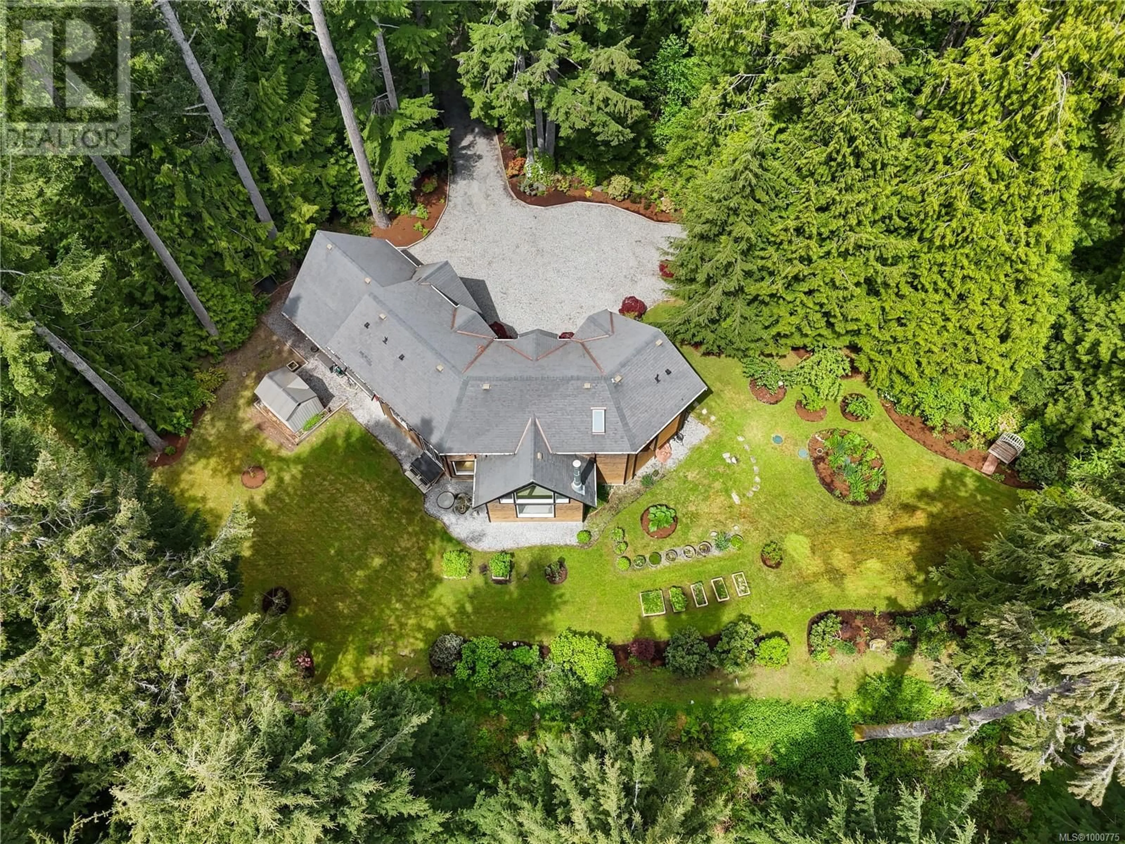 A pic from outside/outdoor area/front of a property/back of a property/a pic from drone, forest/trees view for 770 SHAWNIGAN LAKE ROAD, Shawnigan Lake British Columbia V8H2J1