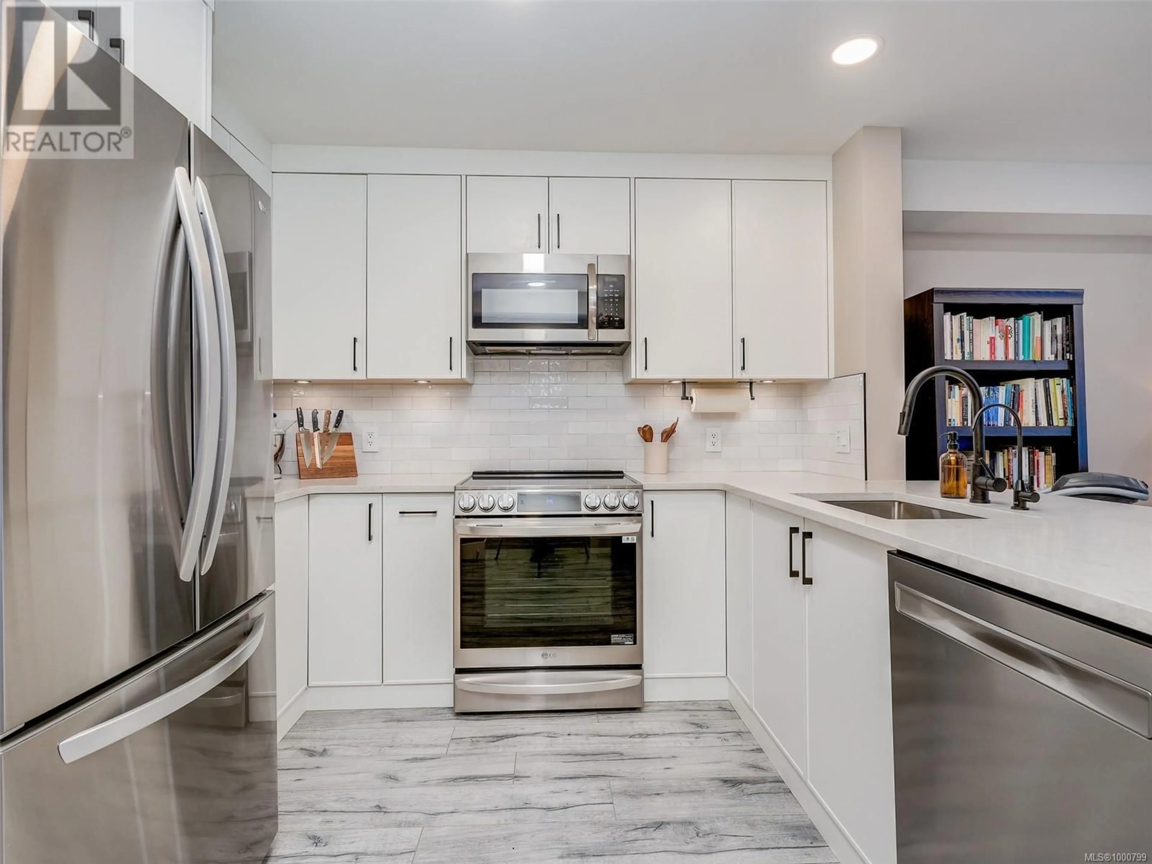 Contemporary kitchen, ceramic/tile floor for 108 - 797 TYEE ROAD, Victoria British Columbia V9A7R4