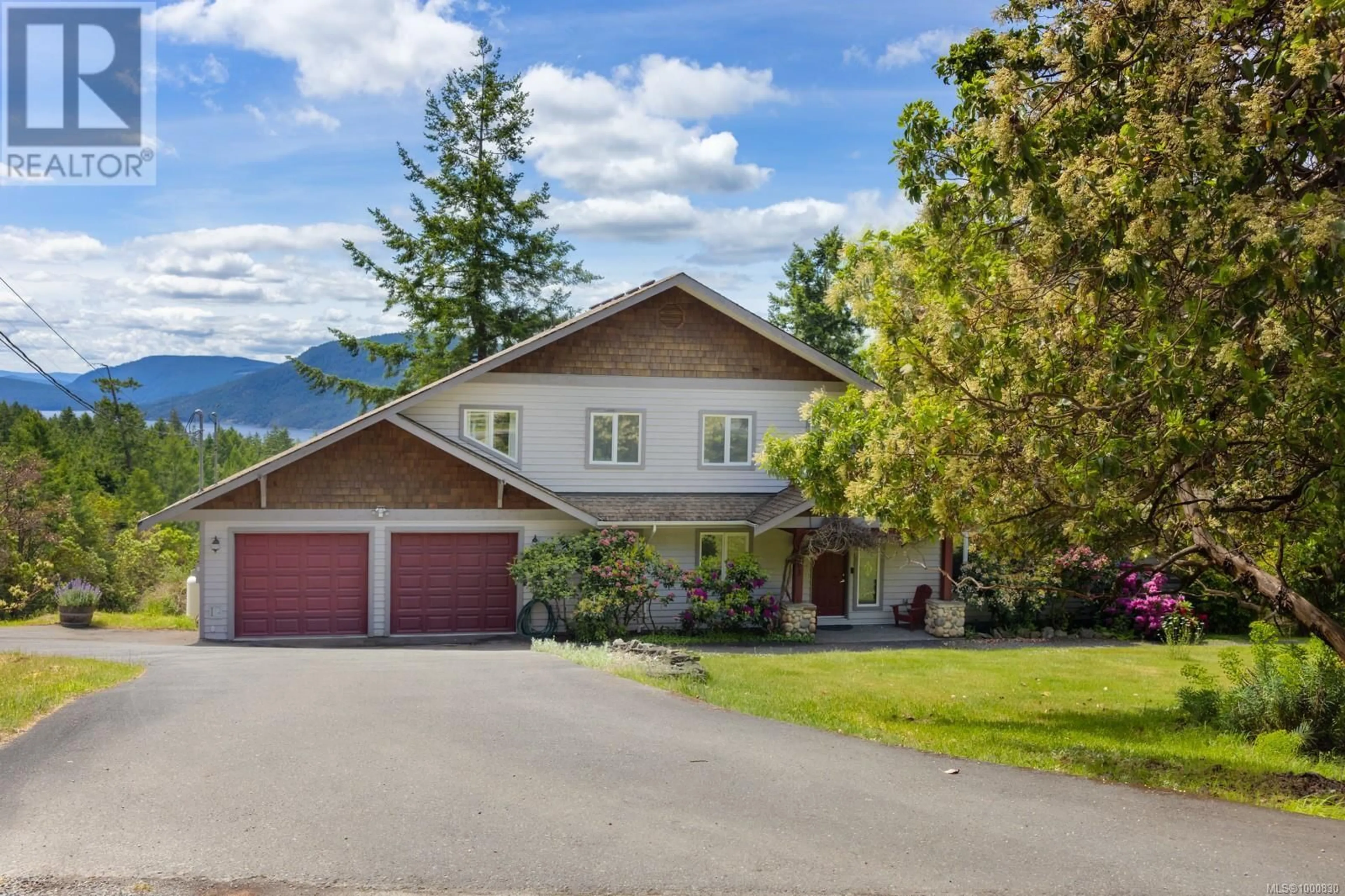 A pic from outside/outdoor area/front of a property/back of a property/a pic from drone, mountain view for 103 MURRELET PLACE, Salt Spring British Columbia V8K1G9