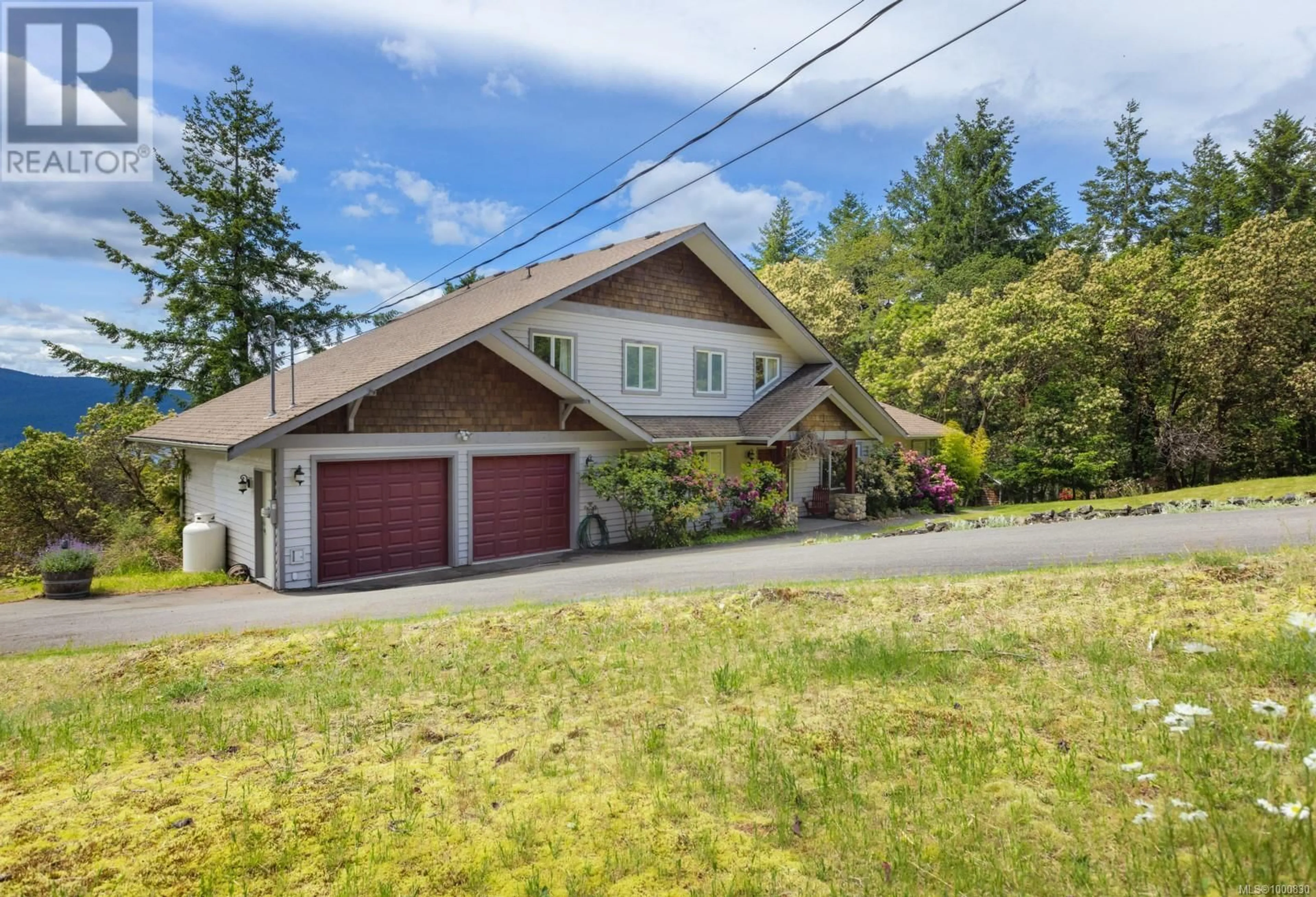 A pic from outside/outdoor area/front of a property/back of a property/a pic from drone, street for 103 MURRELET PLACE, Salt Spring British Columbia V8K1G9