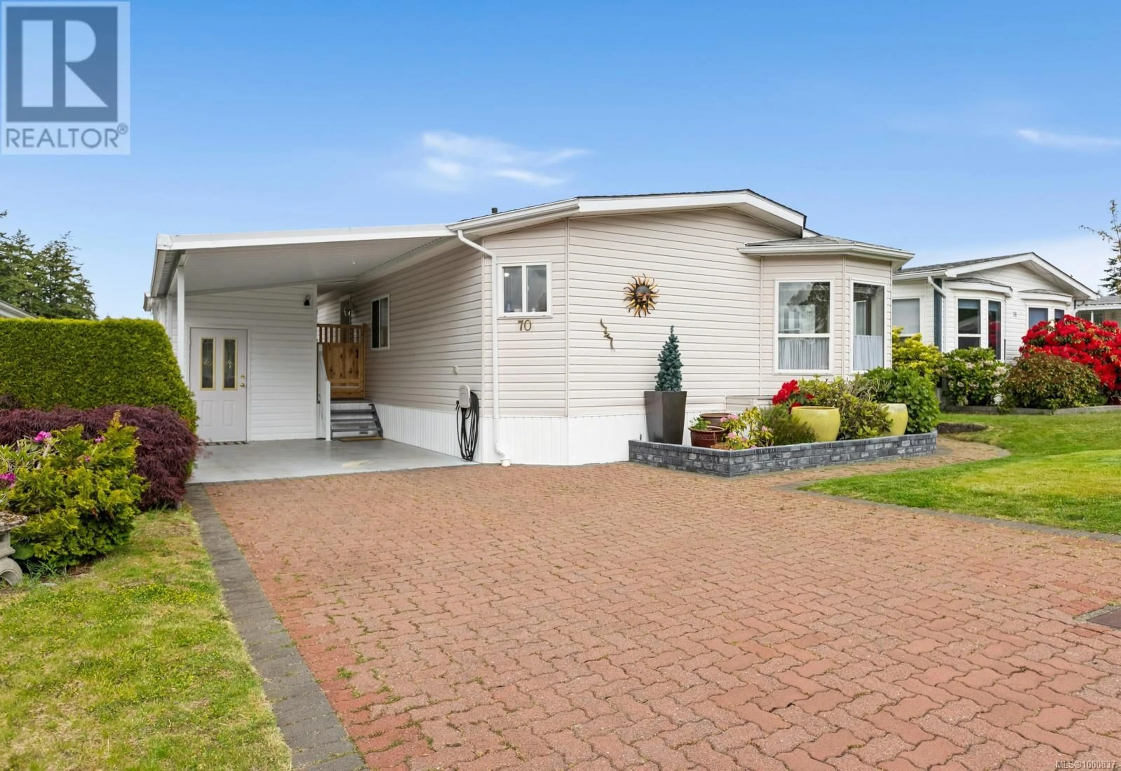 Home with vinyl exterior material, street for 70 - 1927 TZOUHALEM ROAD, Duncan British Columbia V9L5K5