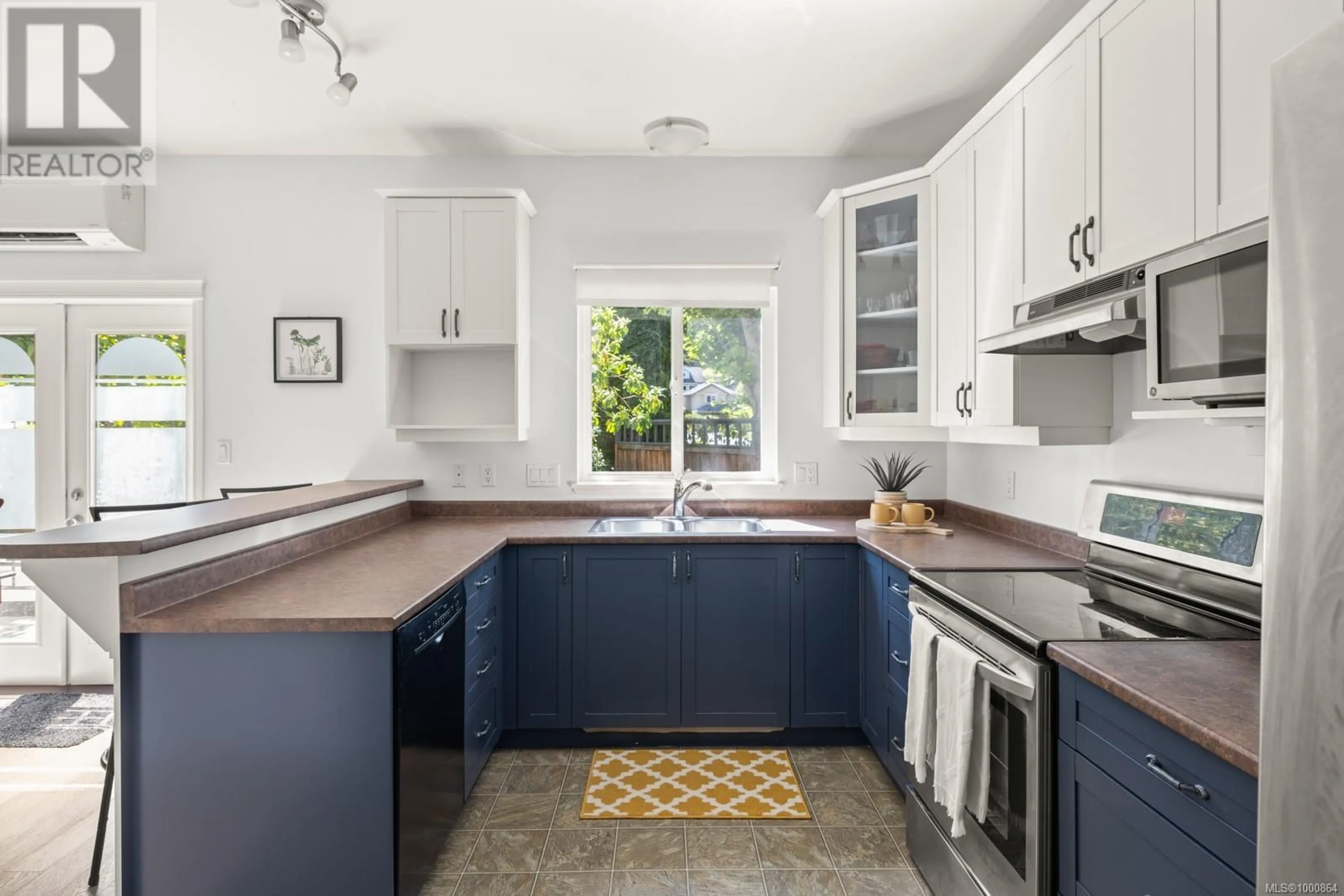 Standard kitchen, ceramic/tile floor for 2454 LUND ROAD, View Royal British Columbia V9B6W4