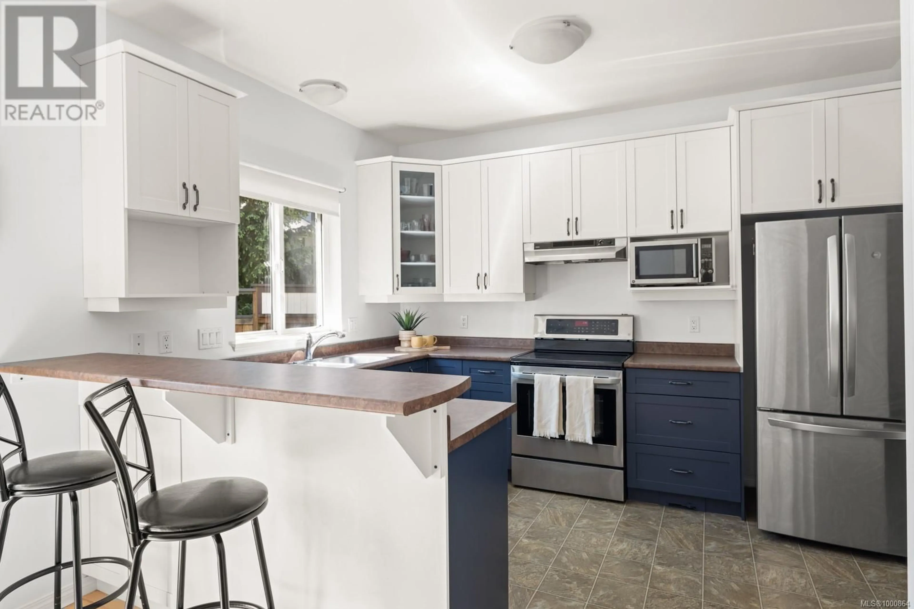 Open concept kitchen, ceramic/tile floor for 2454 LUND ROAD, View Royal British Columbia V9B6W4