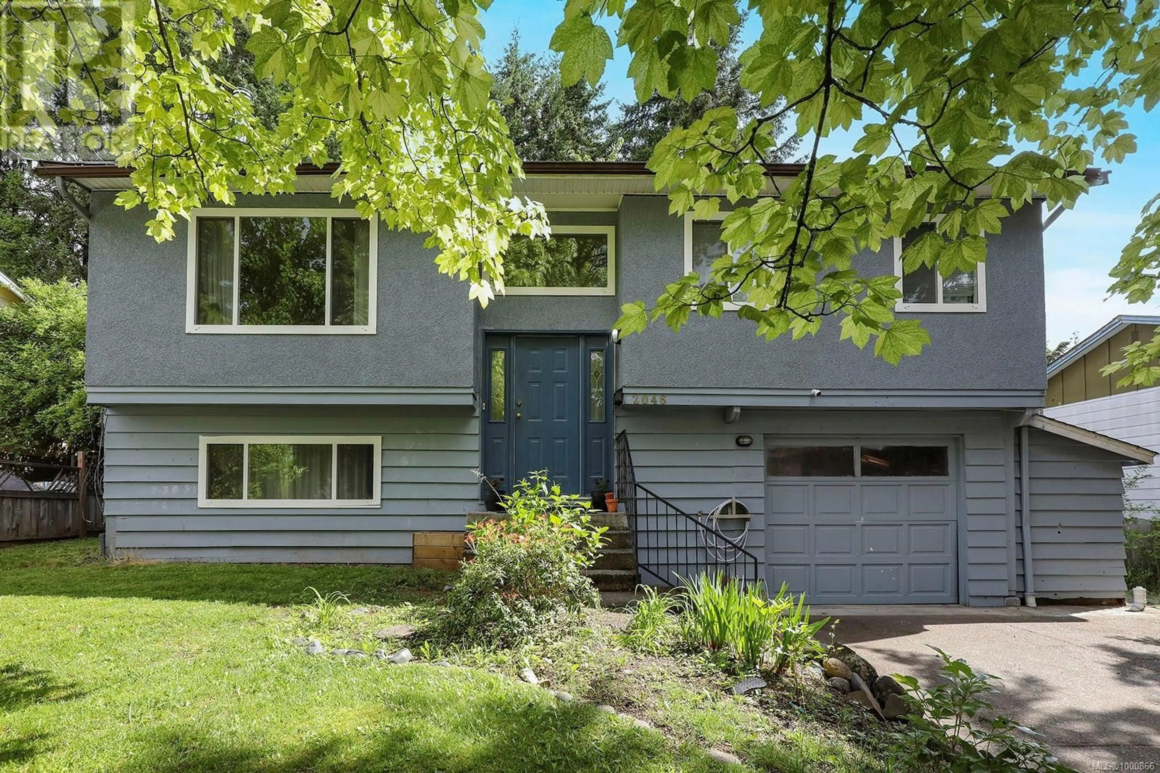 Home with vinyl exterior material, street for 2046 TULL AVENUE, Courtenay British Columbia V9N5P6