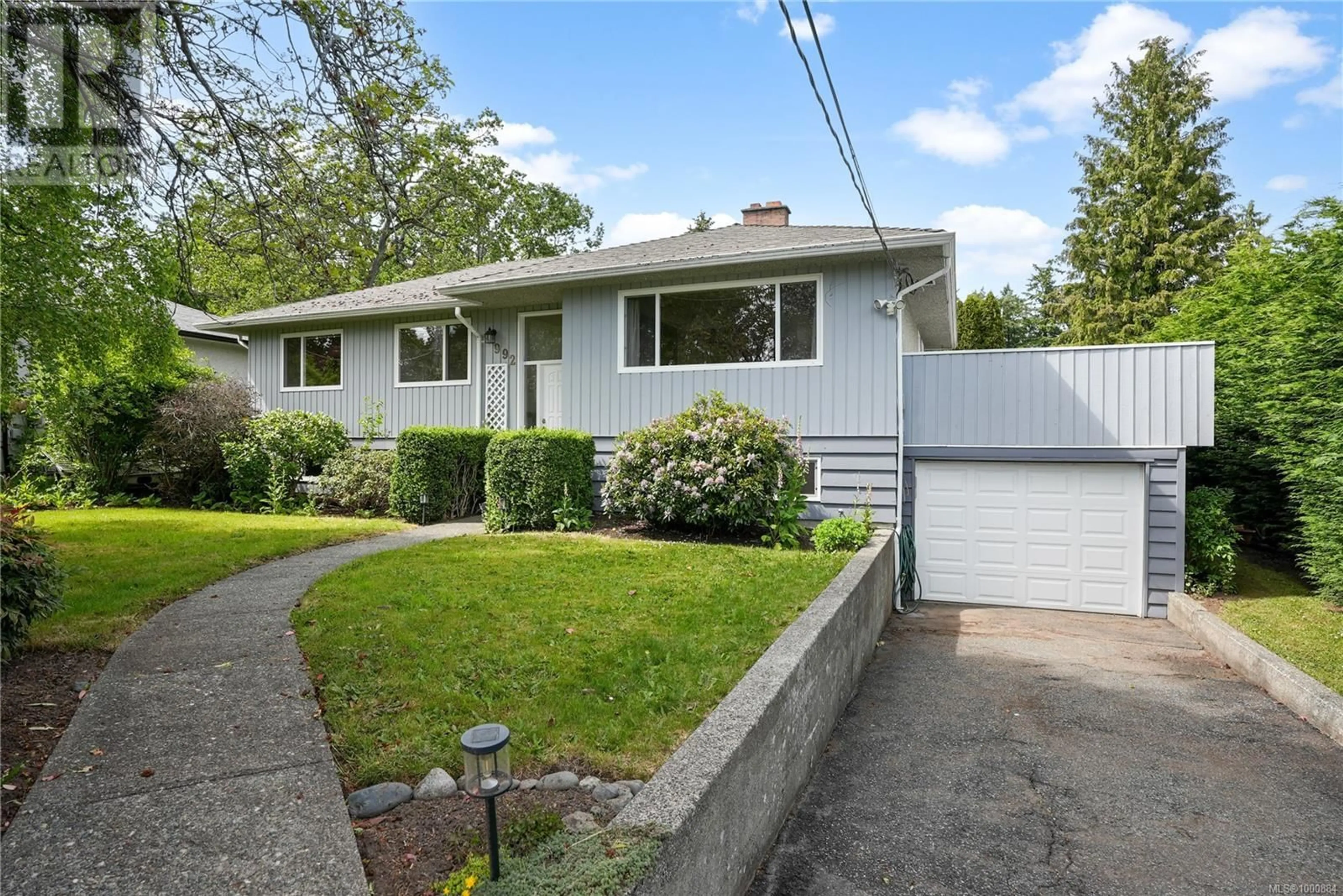 Home with vinyl exterior material, street for 992 AMBASSADOR AVENUE, Saanich British Columbia V8X3N2