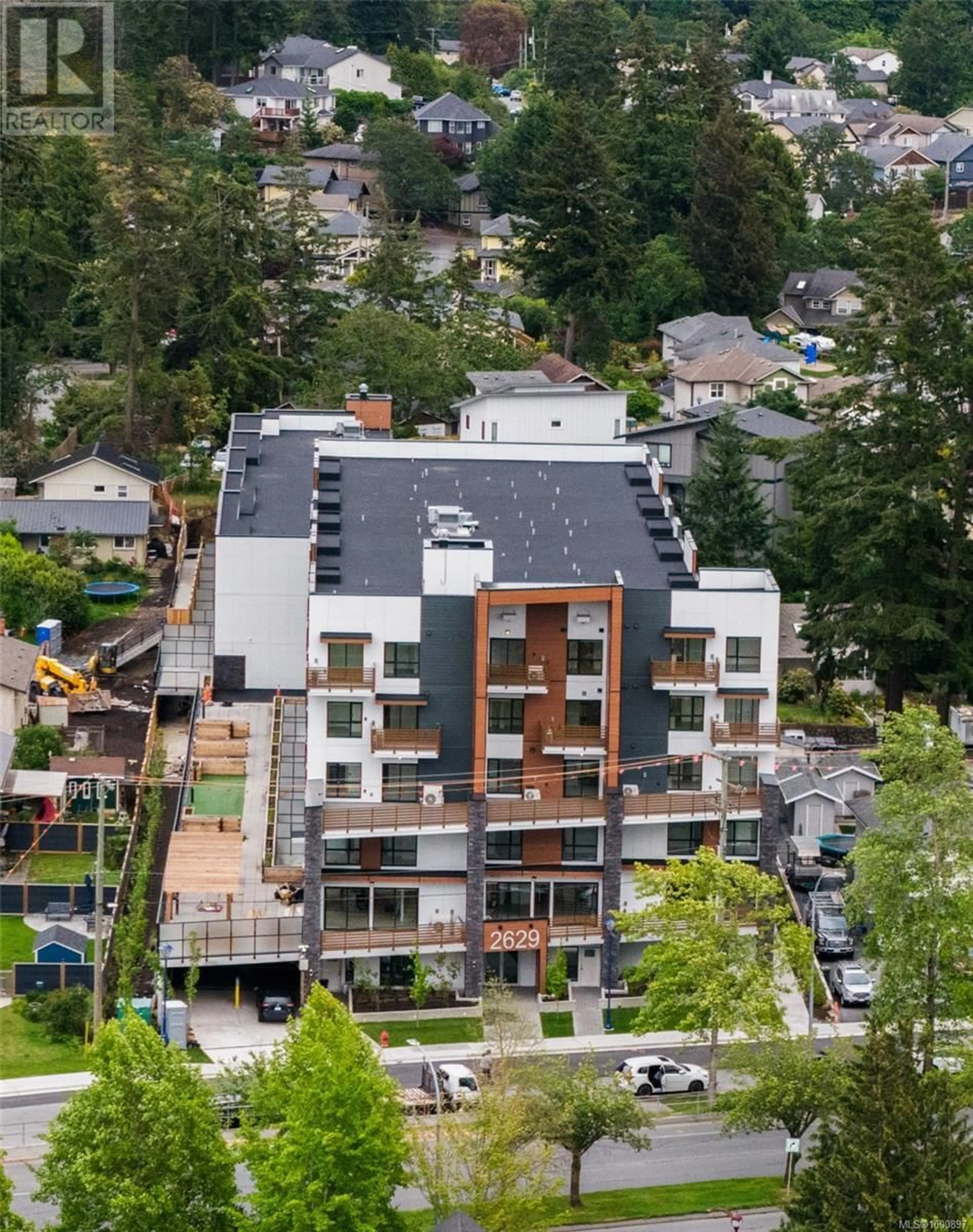 A pic from outside/outdoor area/front of a property/back of a property/a pic from drone, city buildings view from balcony for 405 - 2629 MILLSTREAM ROAD, Langford British Columbia V9B3R8