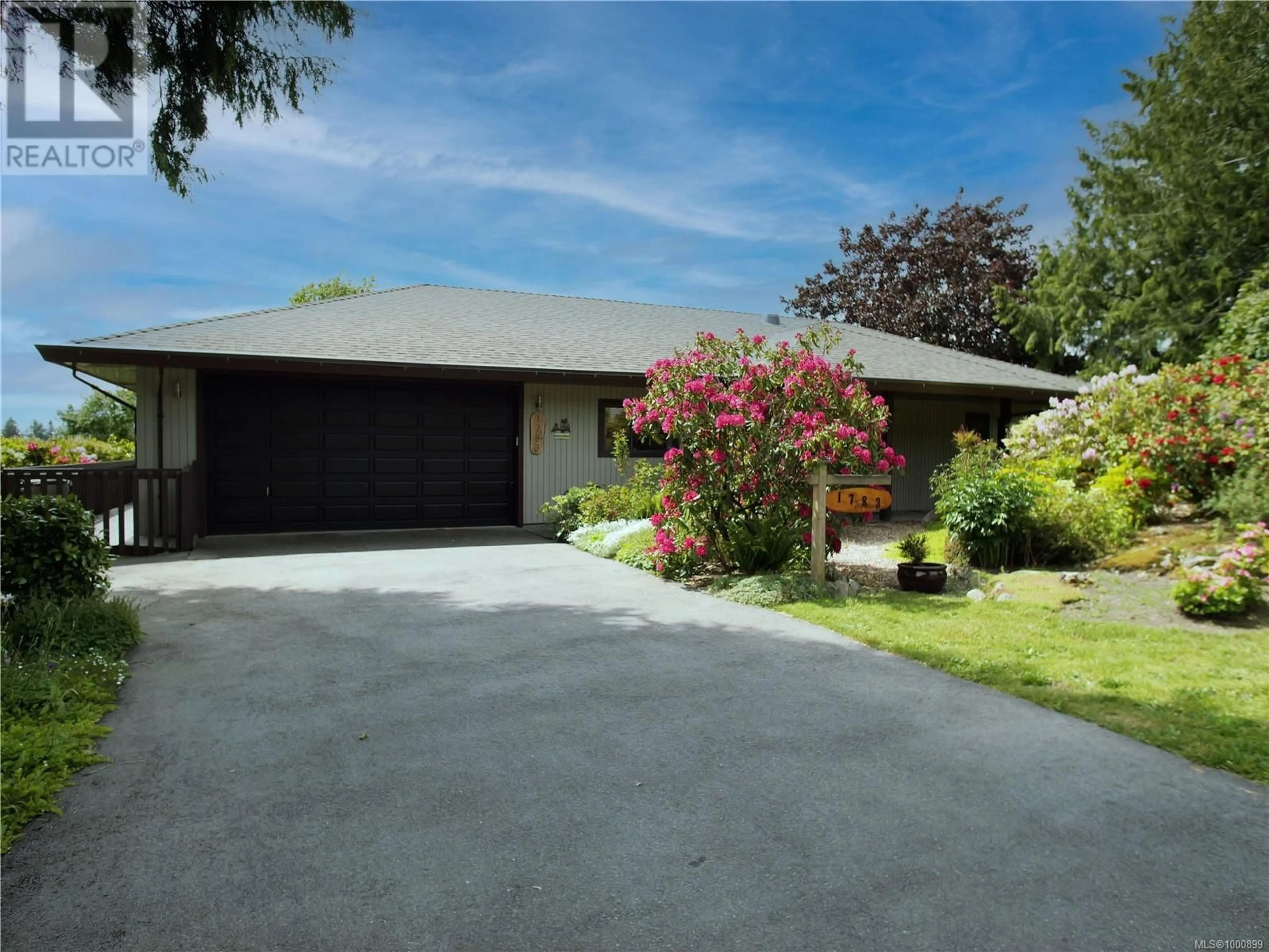 A pic from outside/outdoor area/front of a property/back of a property/a pic from drone, street for 1783 BARRETT DRIVE, North Saanich British Columbia V8L4V1