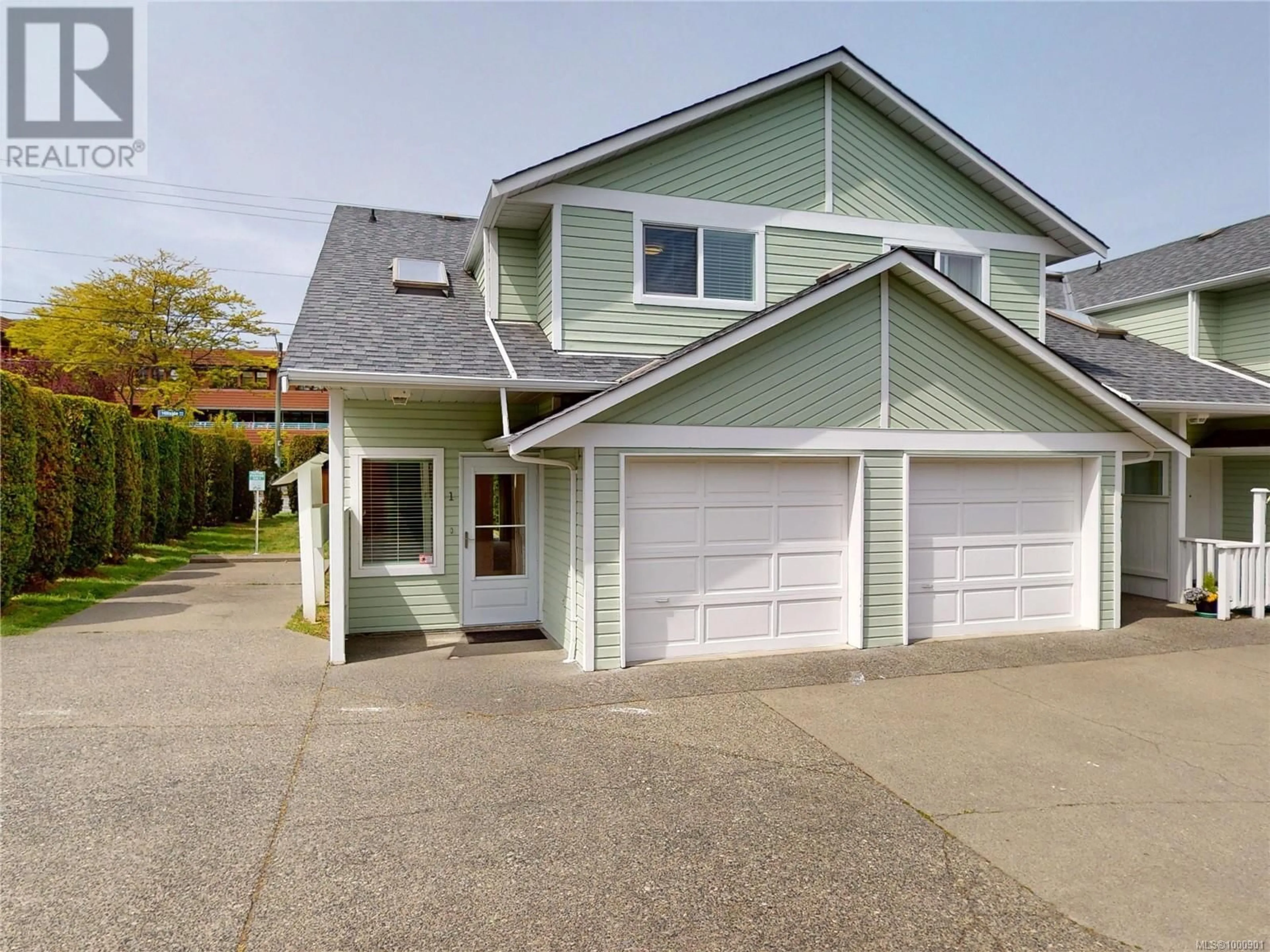 Home with vinyl exterior material, street for 1 - 1441 HILLSIDE AVENUE, Victoria British Columbia V8T2B9