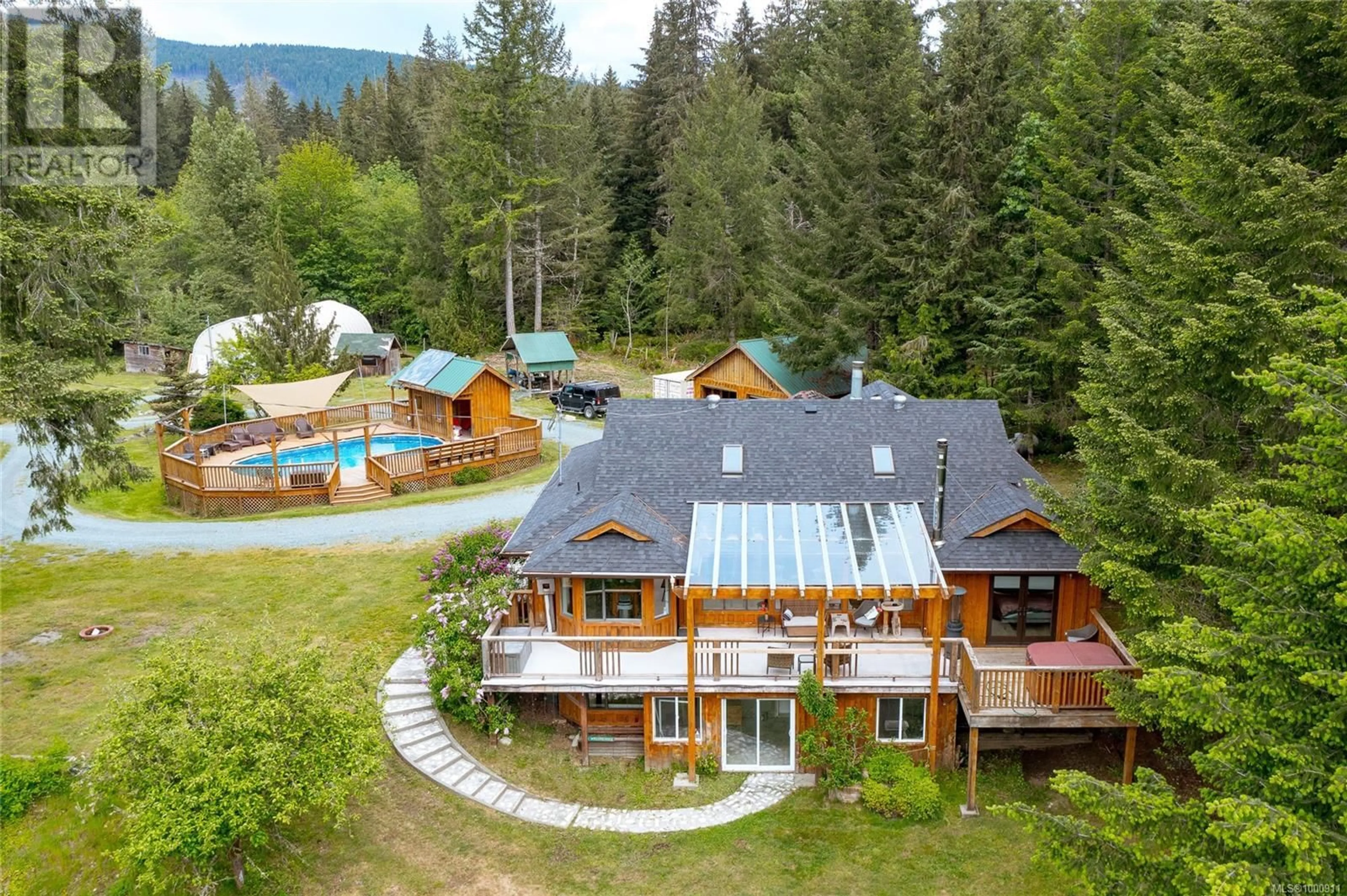 A pic from outside/outdoor area/front of a property/back of a property/a pic from drone, mountain view for 5982 MAYO ROAD, Lake Cowichan British Columbia V0R2G0