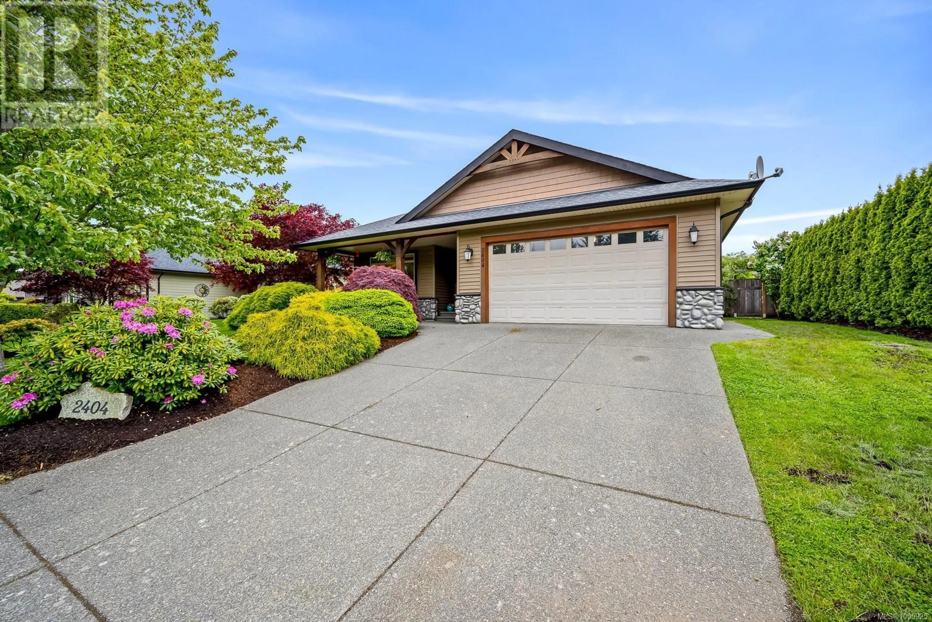 Home with vinyl exterior material, street for 2404 TUTOR DRIVE, Comox British Columbia V9M0A7