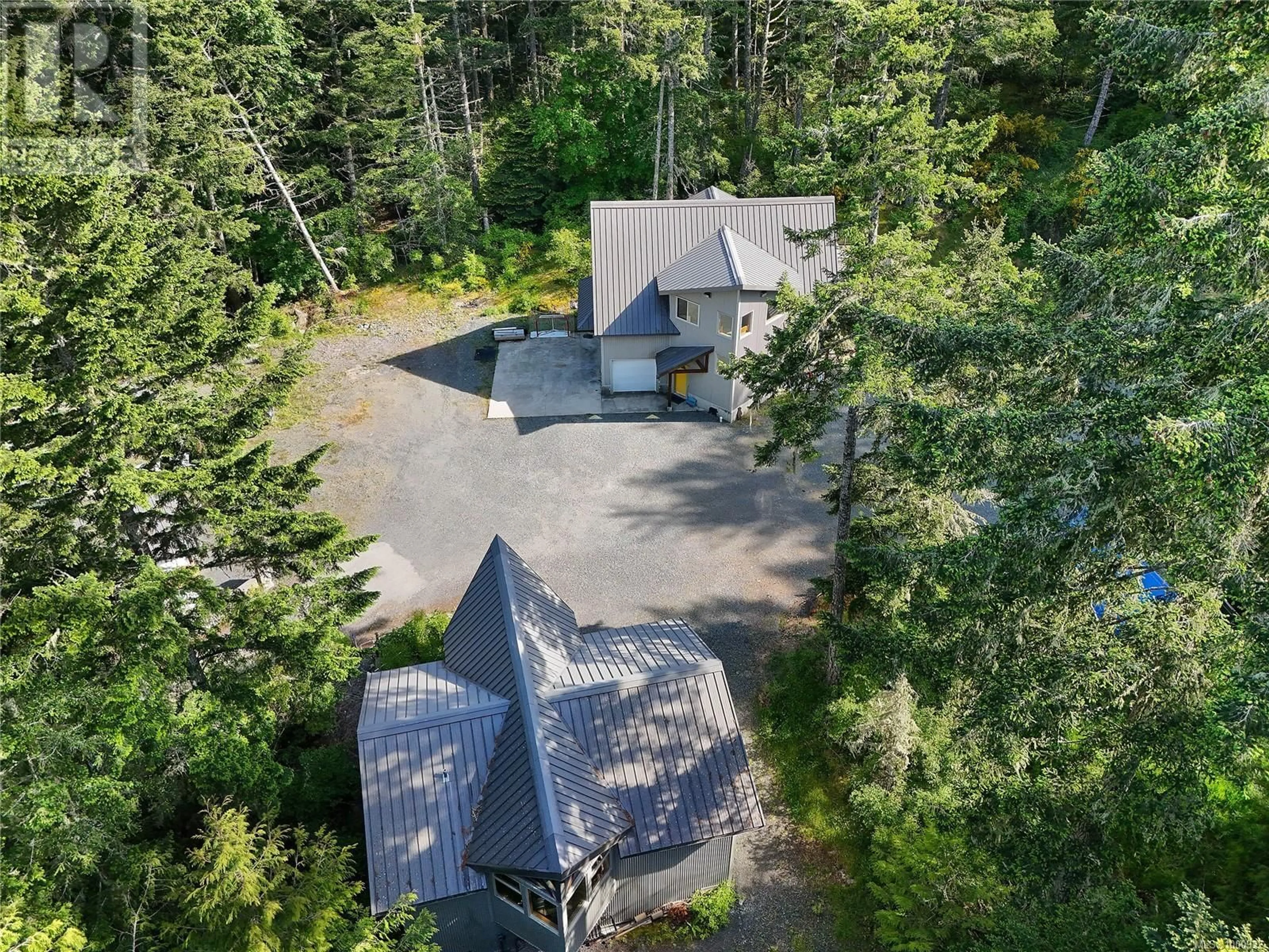 A pic from outside/outdoor area/front of a property/back of a property/a pic from drone, forest/trees view for 1135 WOODLEY GHYLL DRIVE, Metchosin British Columbia V9C4H9