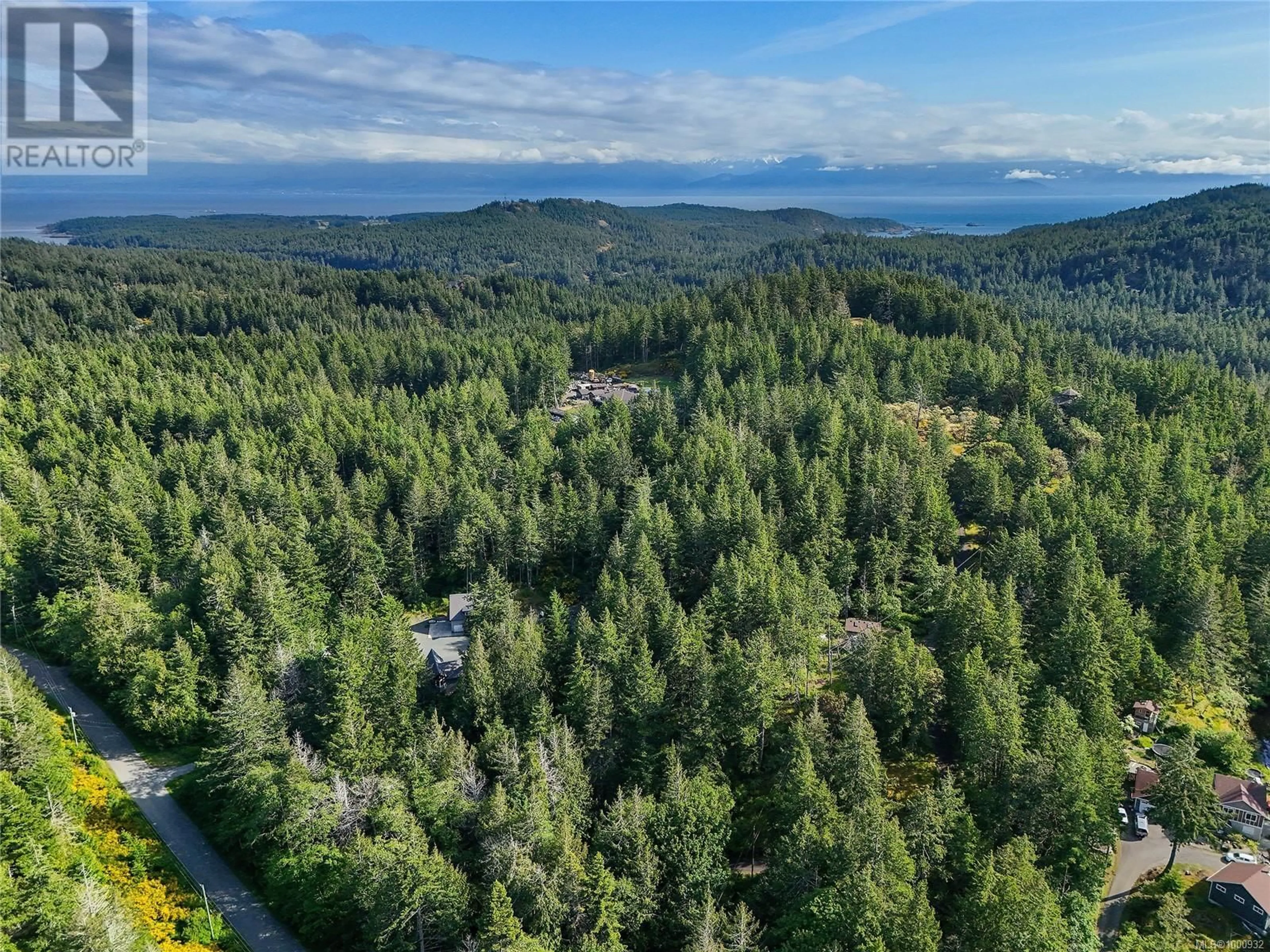 A pic from outside/outdoor area/front of a property/back of a property/a pic from drone, forest/trees view for 1135 WOODLEY GHYLL DRIVE, Metchosin British Columbia V9C4H9