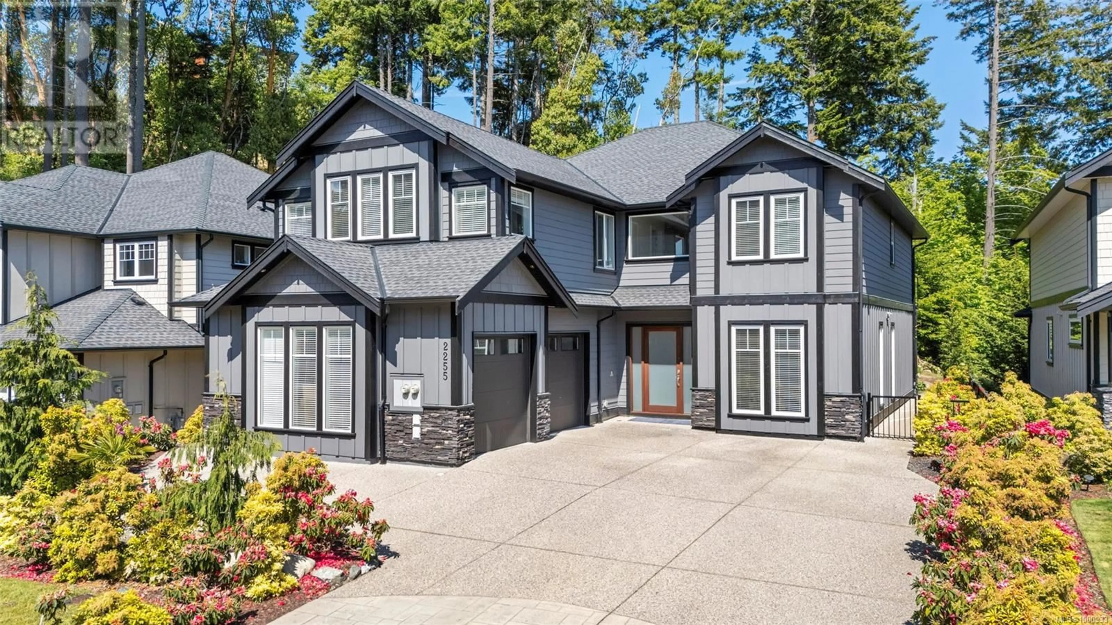 Home with vinyl exterior material, street for 2255 NICKLAUS DRIVE, Langford British Columbia V9B0L2