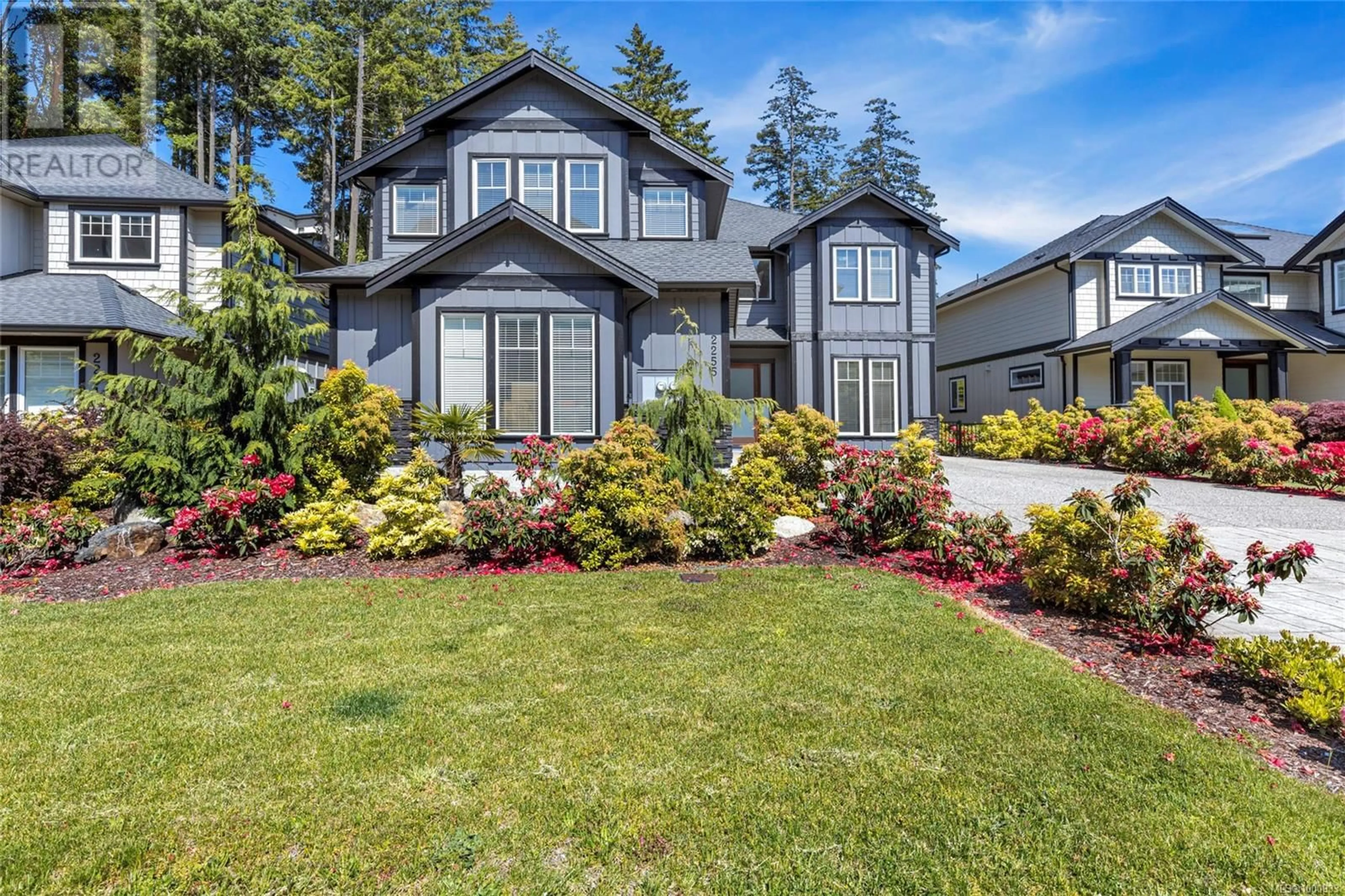 Home with vinyl exterior material, street for 2255 NICKLAUS DRIVE, Langford British Columbia V9B0L2