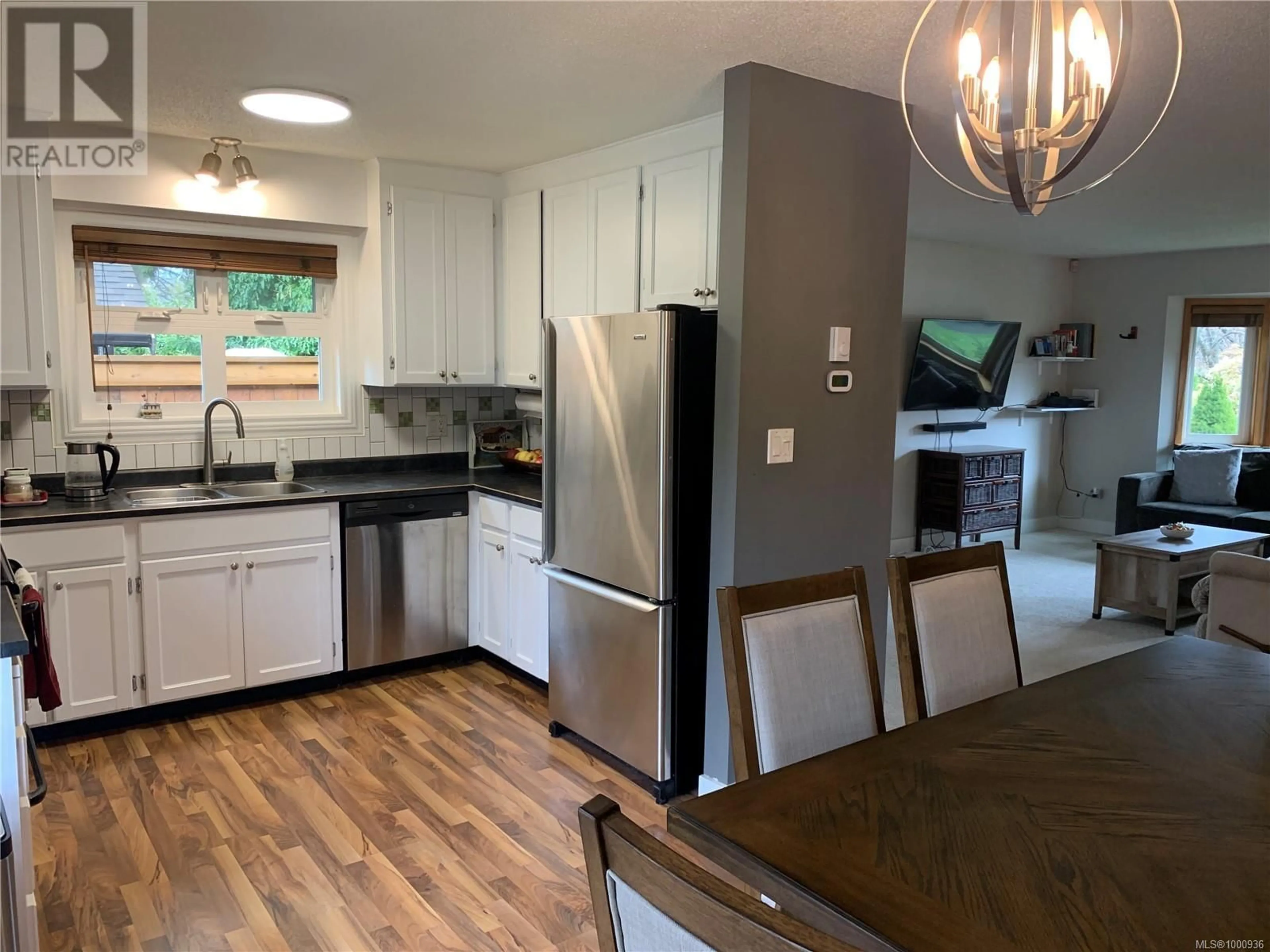Open concept kitchen, wood/laminate floor for 2606 SODERHOLM ROAD, Campbell River British Columbia V9W5R1