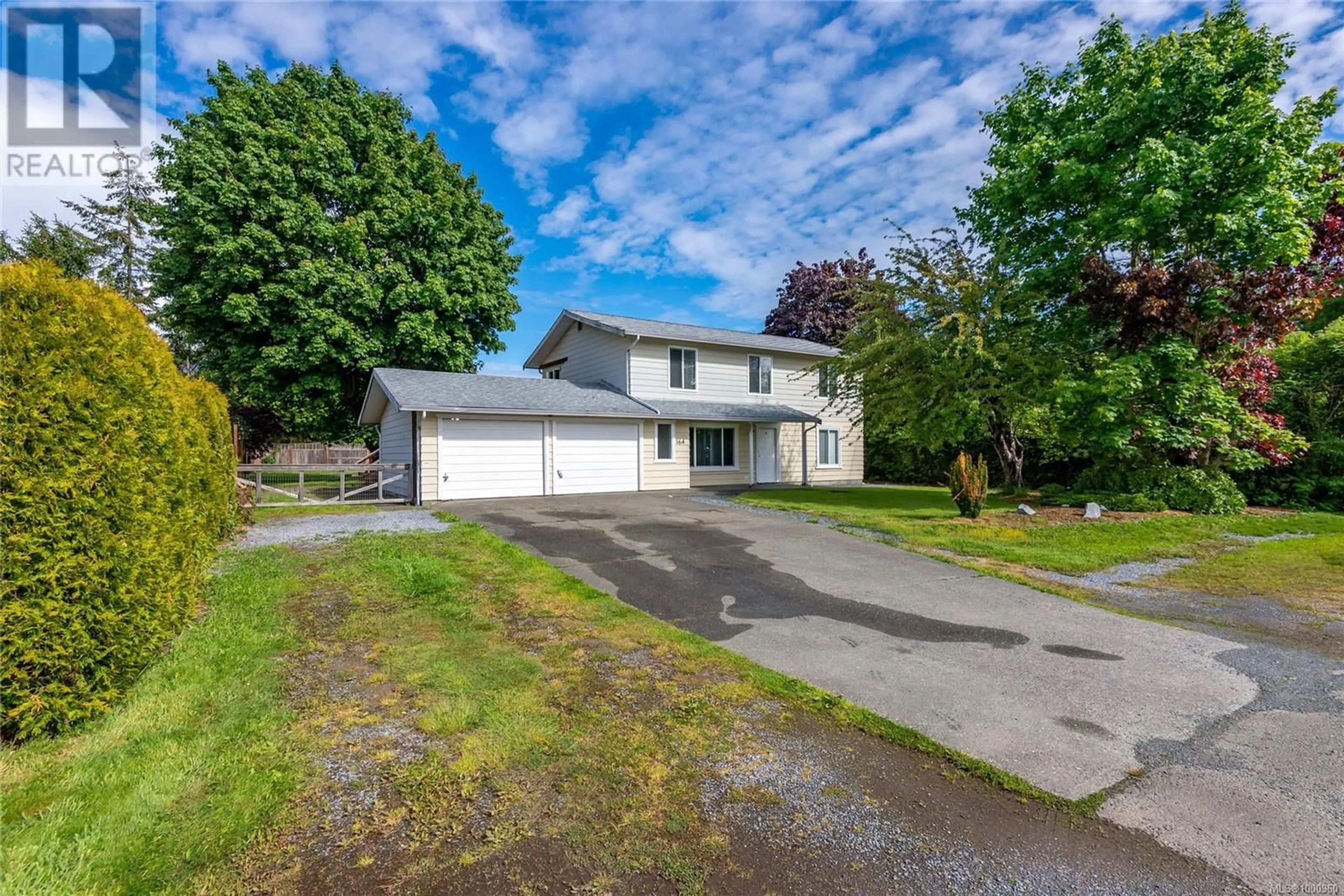 A pic from outside/outdoor area/front of a property/back of a property/a pic from drone, street for 164 CRAWFORD ROAD, Oyster River British Columbia V9H1K3