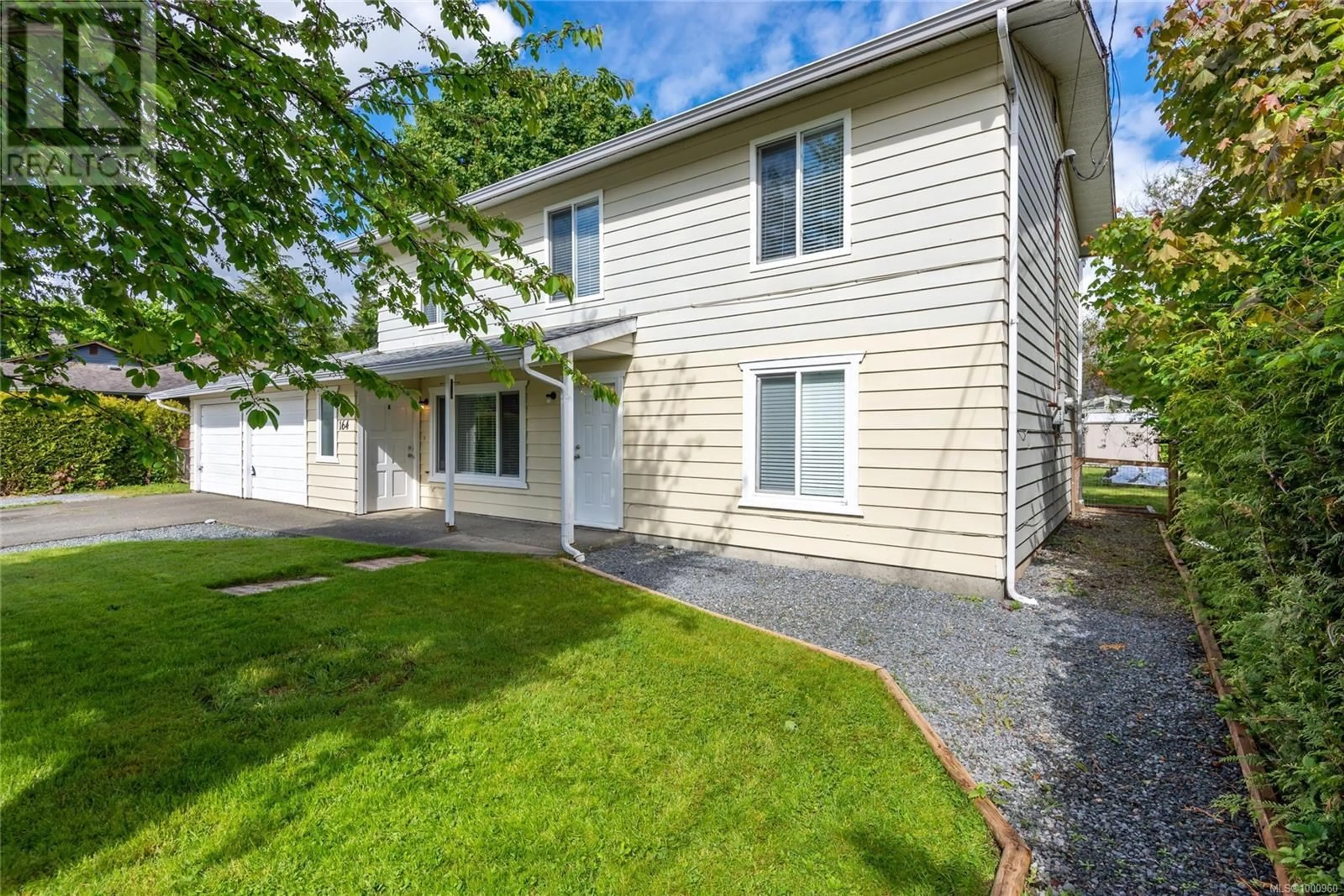 Home with vinyl exterior material, street for 164 CRAWFORD ROAD, Oyster River British Columbia V9H1K3