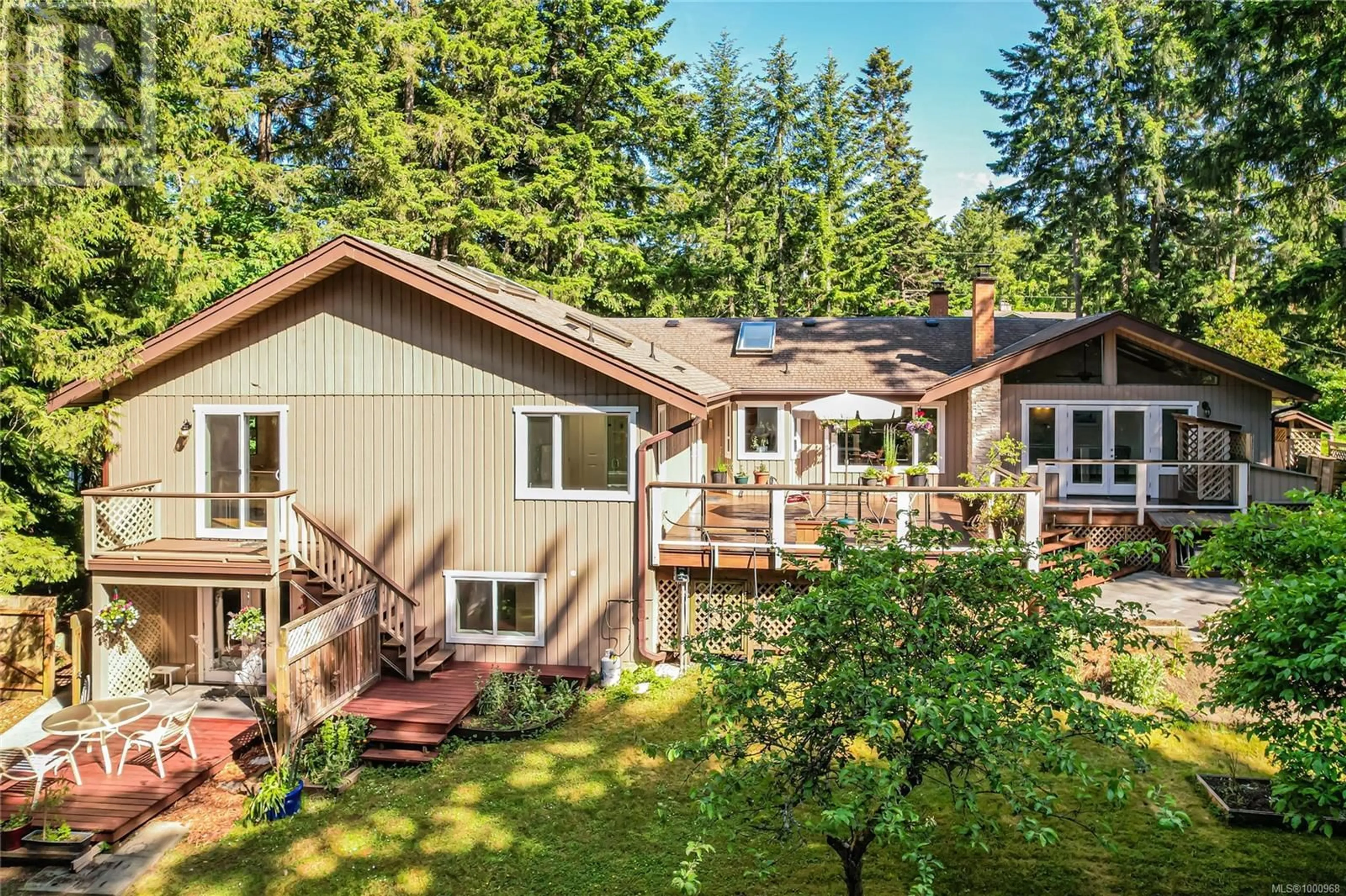 A pic from outside/outdoor area/front of a property/back of a property/a pic from drone, forest/trees view for 9486 GLENELG AVENUE, North Saanich British Columbia V8L5G9
