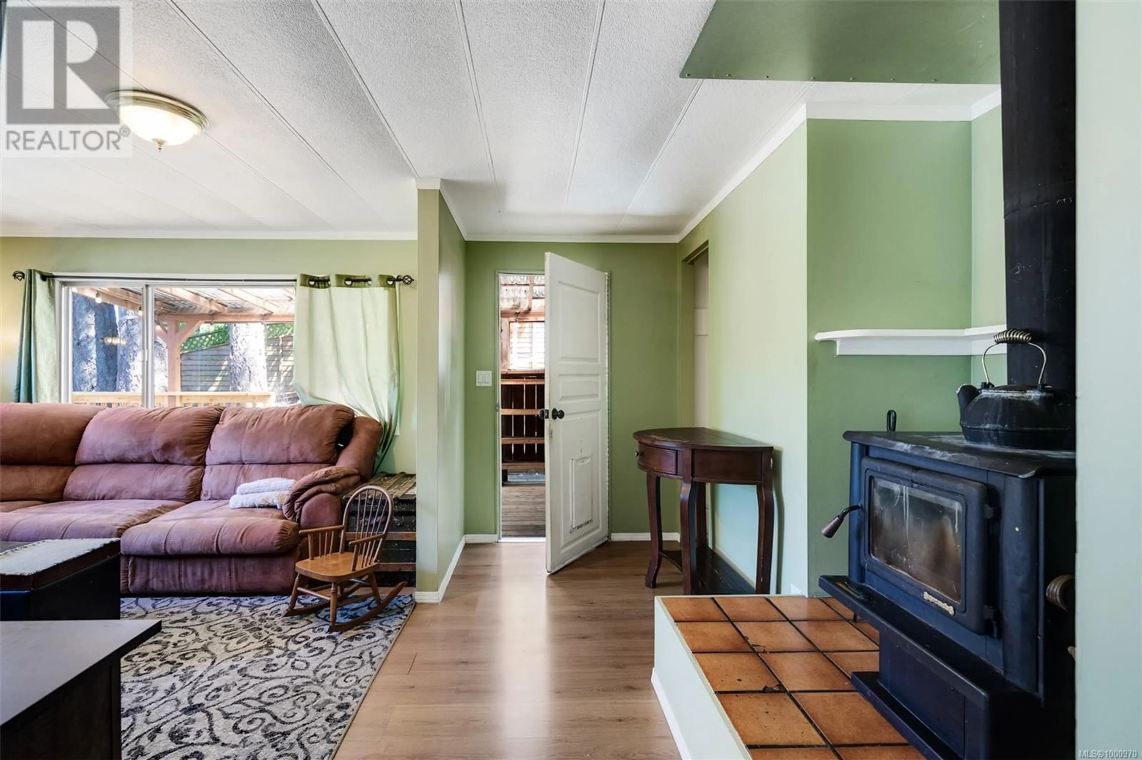 Living room with furniture, unknown for 3316 LODMELL ROAD, Langford British Columbia V9C3E5