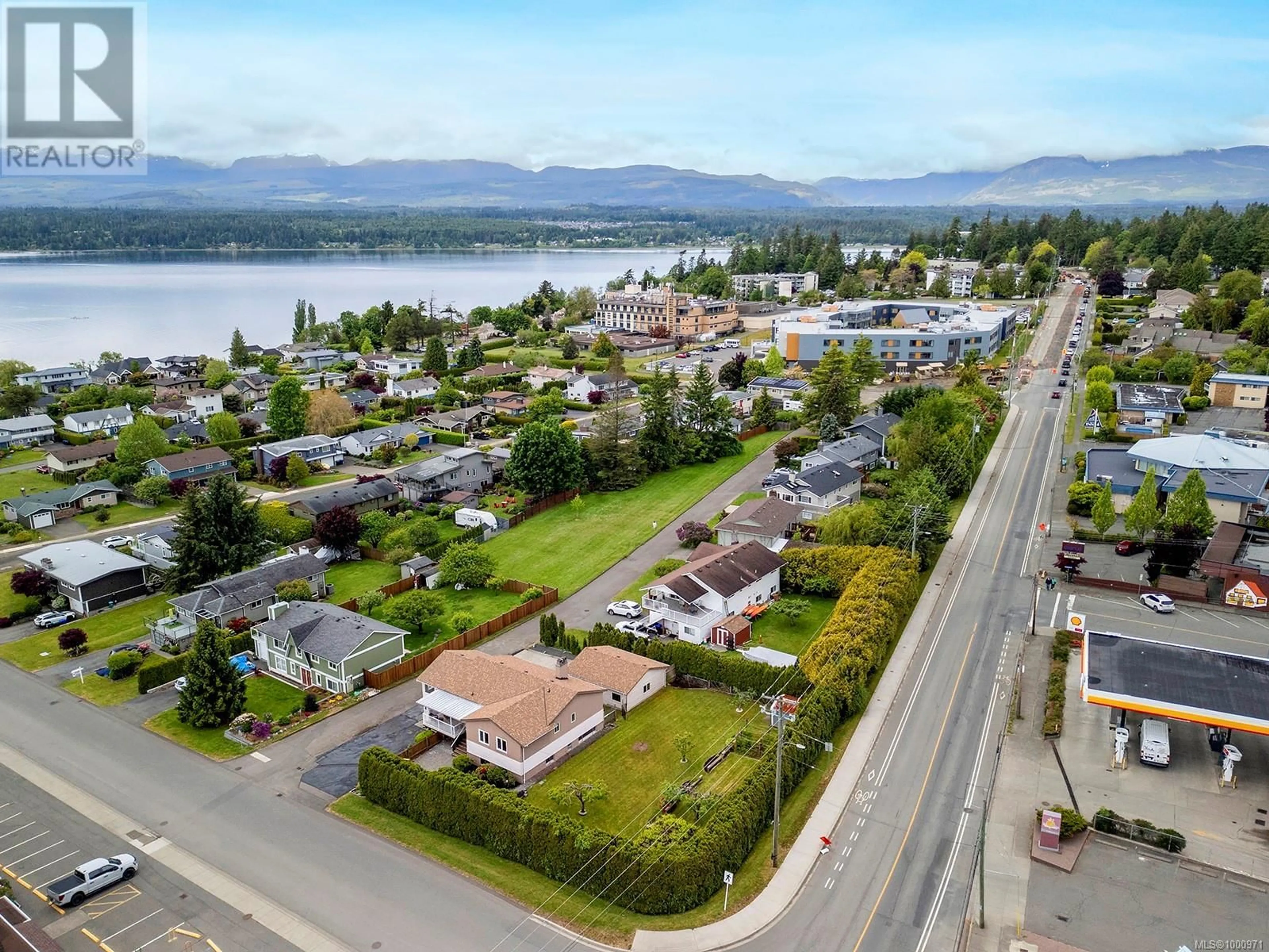 A pic from outside/outdoor area/front of a property/back of a property/a pic from drone, water/lake/river/ocean view for 251 BEACH DRIVE, Comox British Columbia V9N1W3