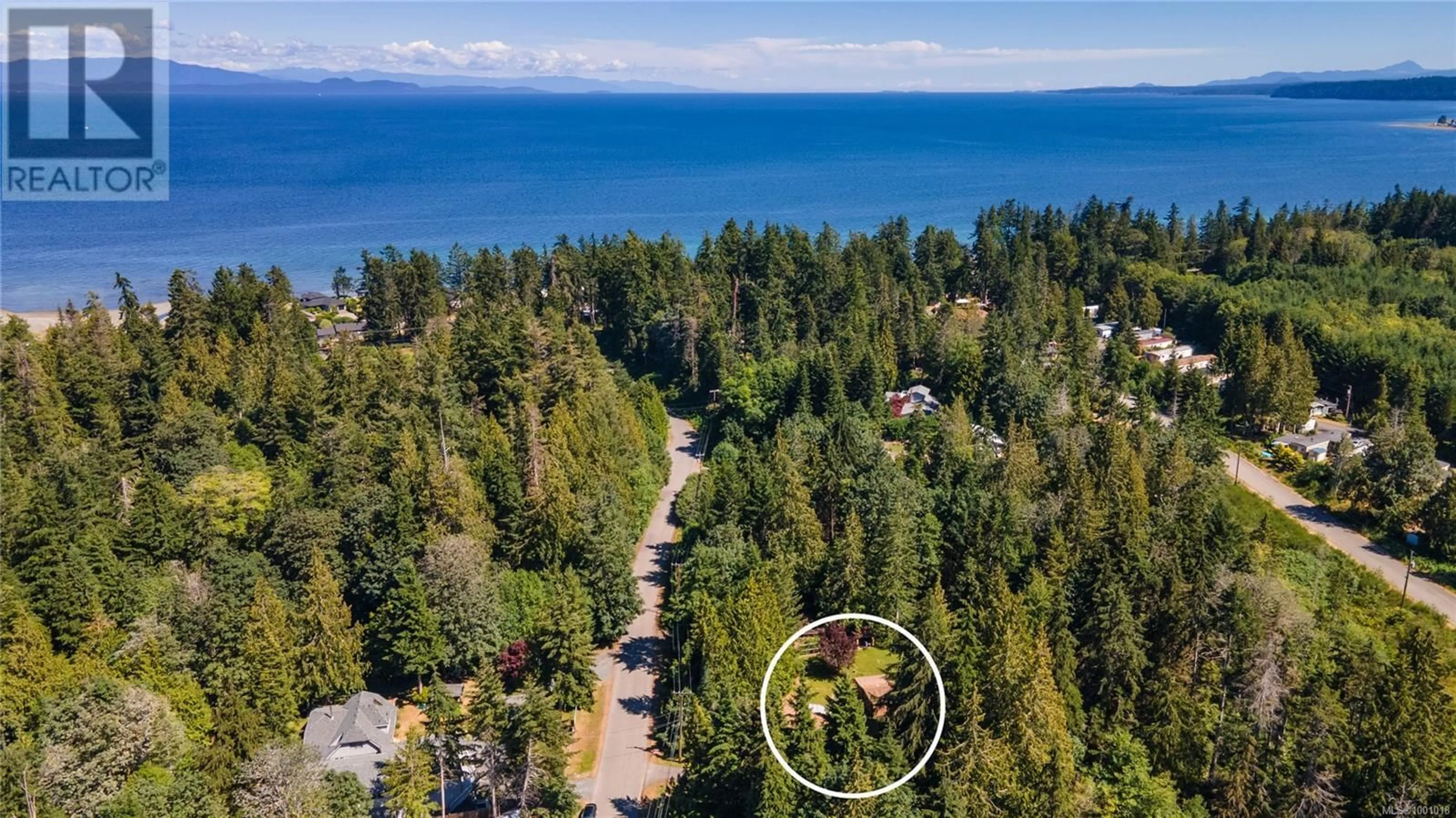 A pic from outside/outdoor area/front of a property/back of a property/a pic from drone, water/lake/river/ocean view for 3826 CHARLTON DRIVE, Qualicum Beach British Columbia V9K1Z3