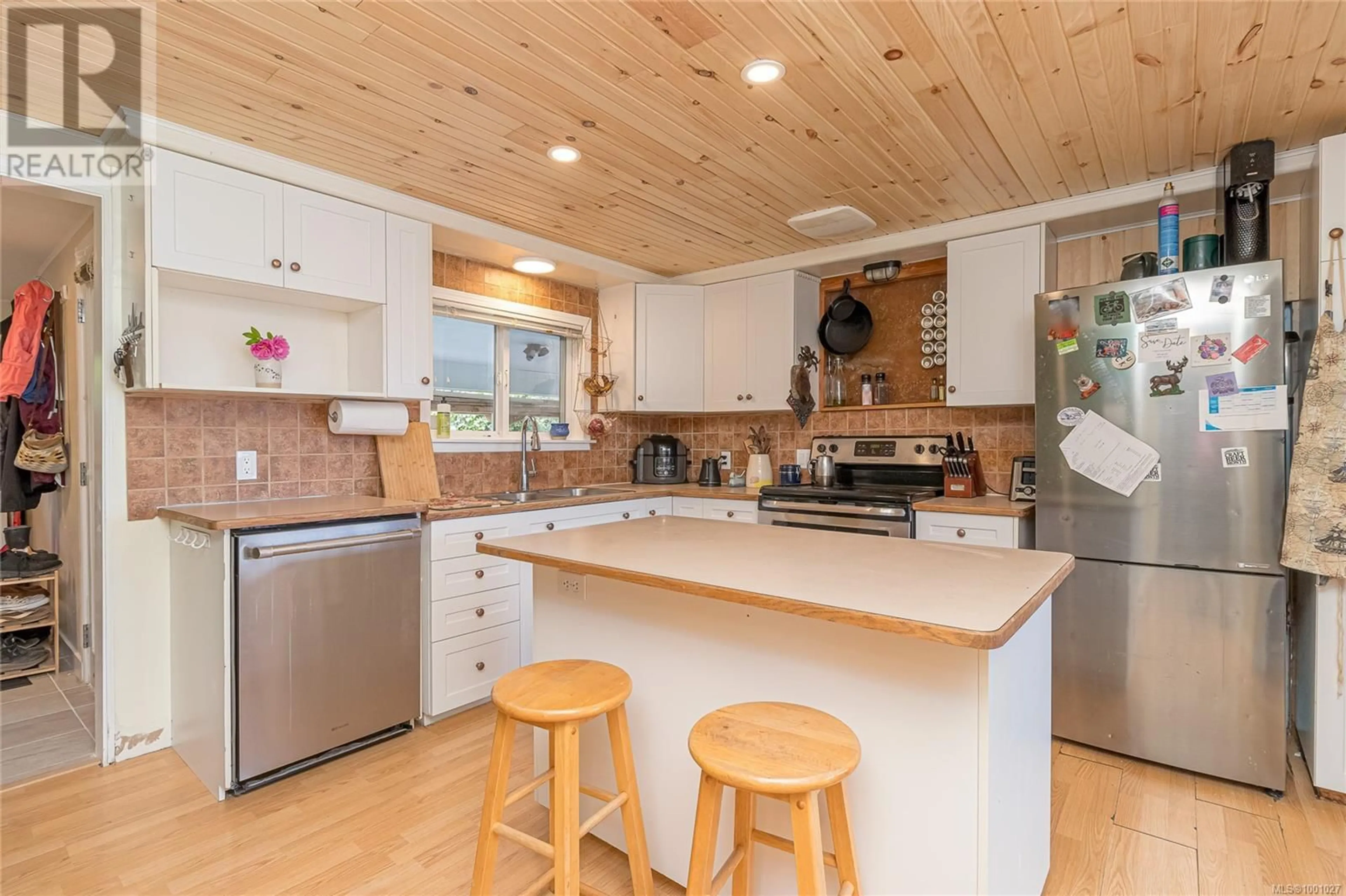 Open concept kitchen, wood/laminate floor for 8060 YORK AVENUE, Crofton British Columbia V0R1R0