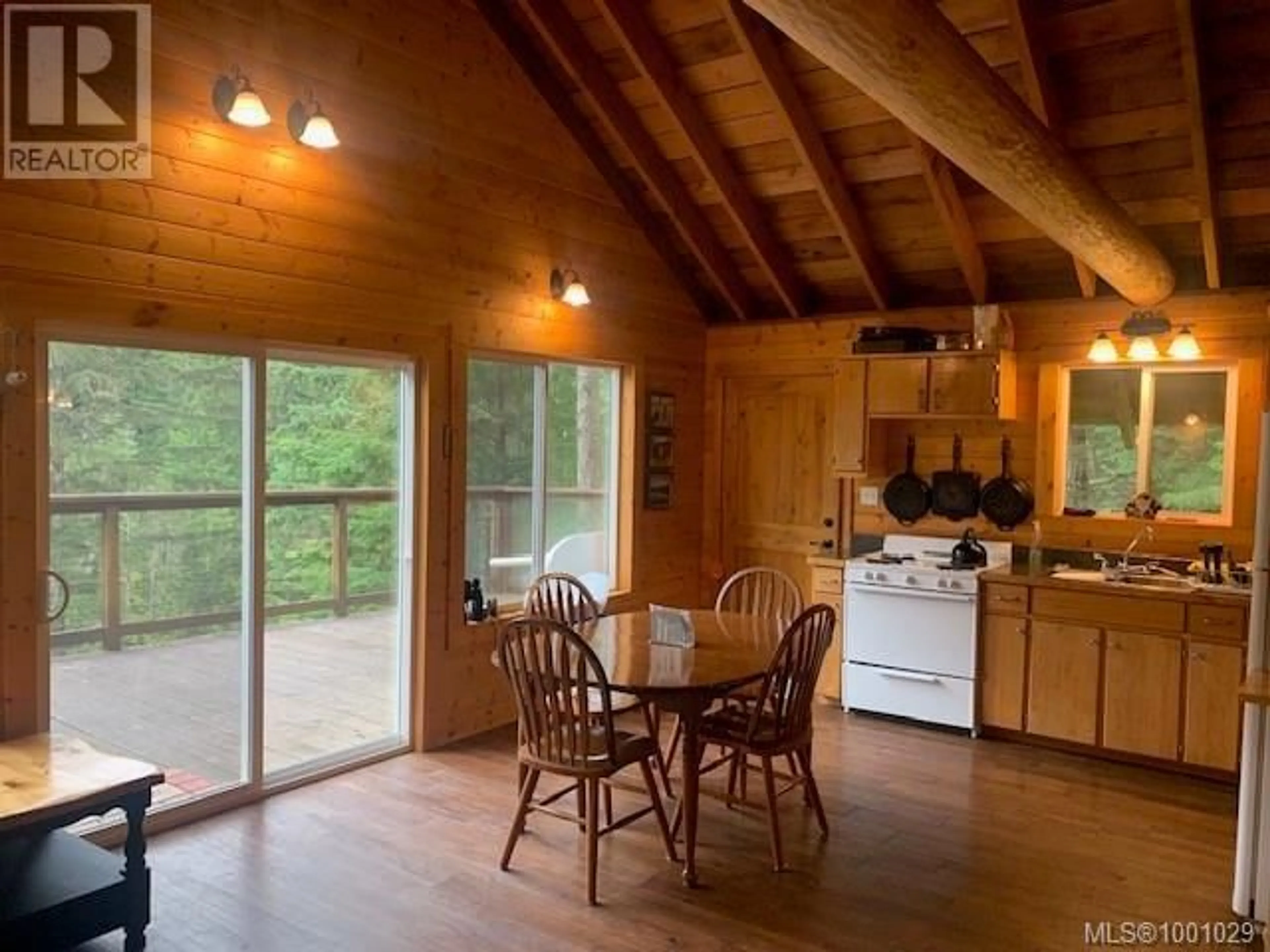 Open concept kitchen, wood/laminate floor for 58 BUSBY ISLAND, Sonora Island British Columbia V0N3P0
