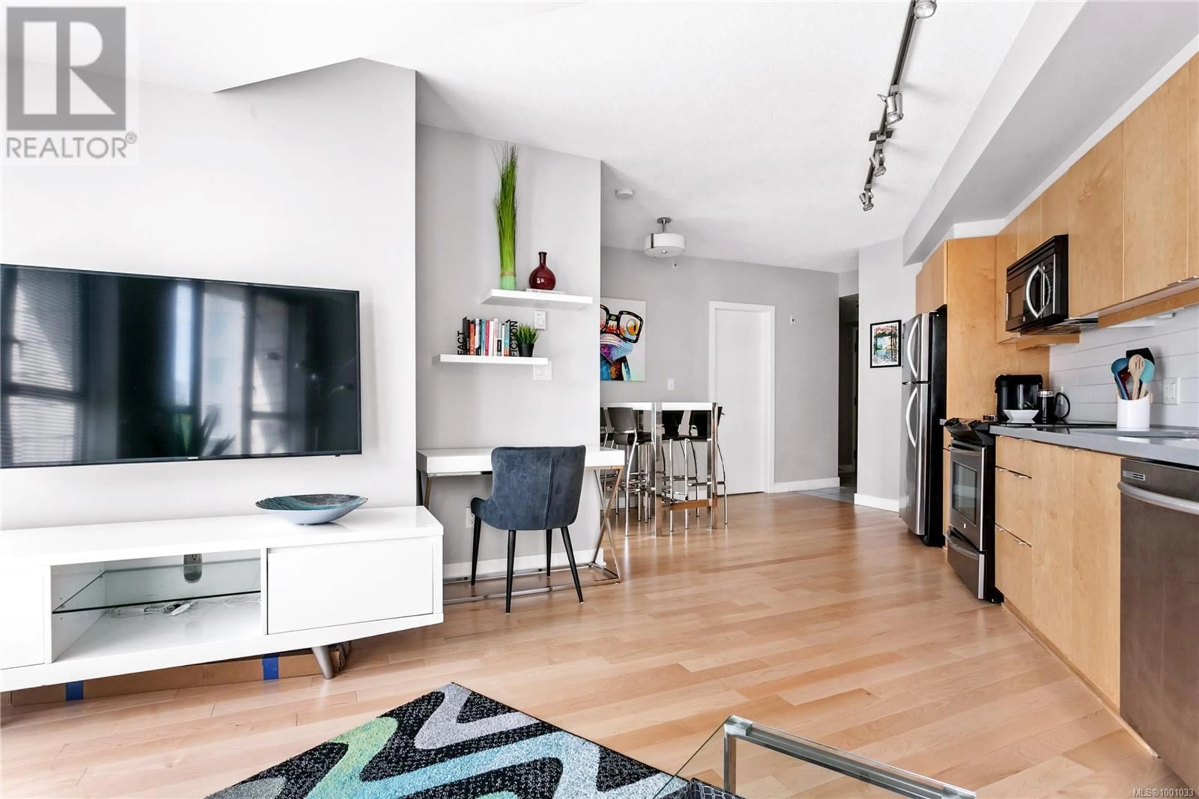 Living room with furniture, unknown for 202 - 760 JOHNSON STREET, Victoria British Columbia V8W1N1