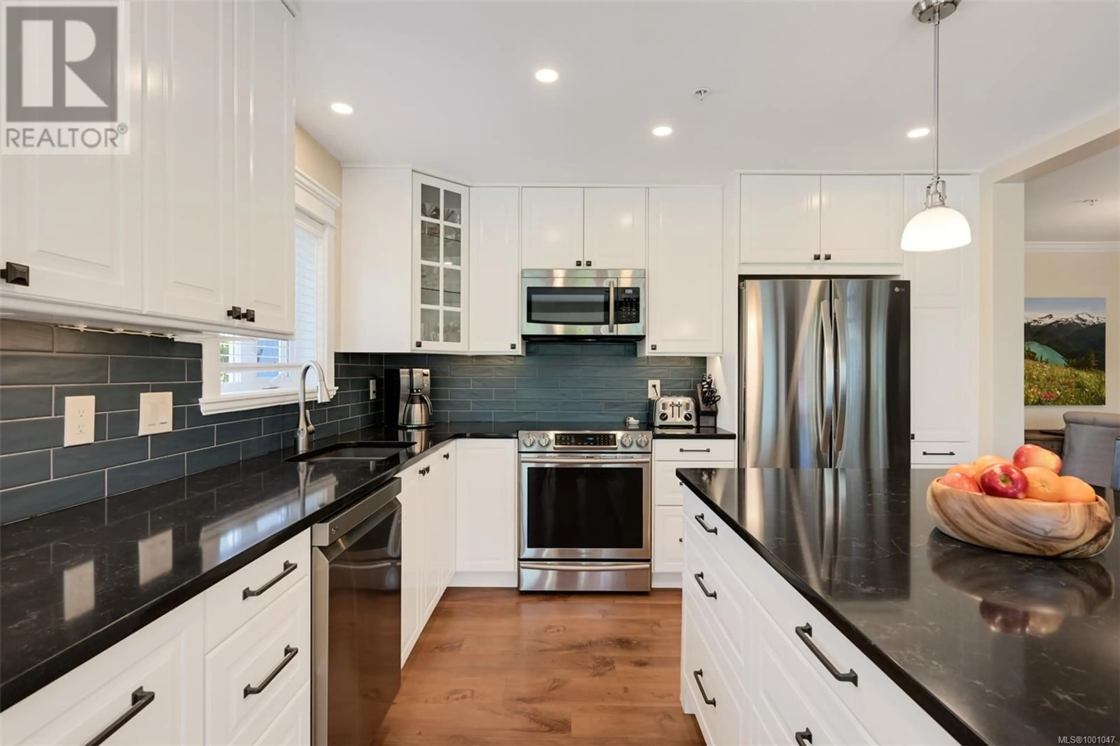 Contemporary kitchen, ceramic/tile floor for 101 - 535 HEATHERDALE LANE, Saanich British Columbia V8Z0A4