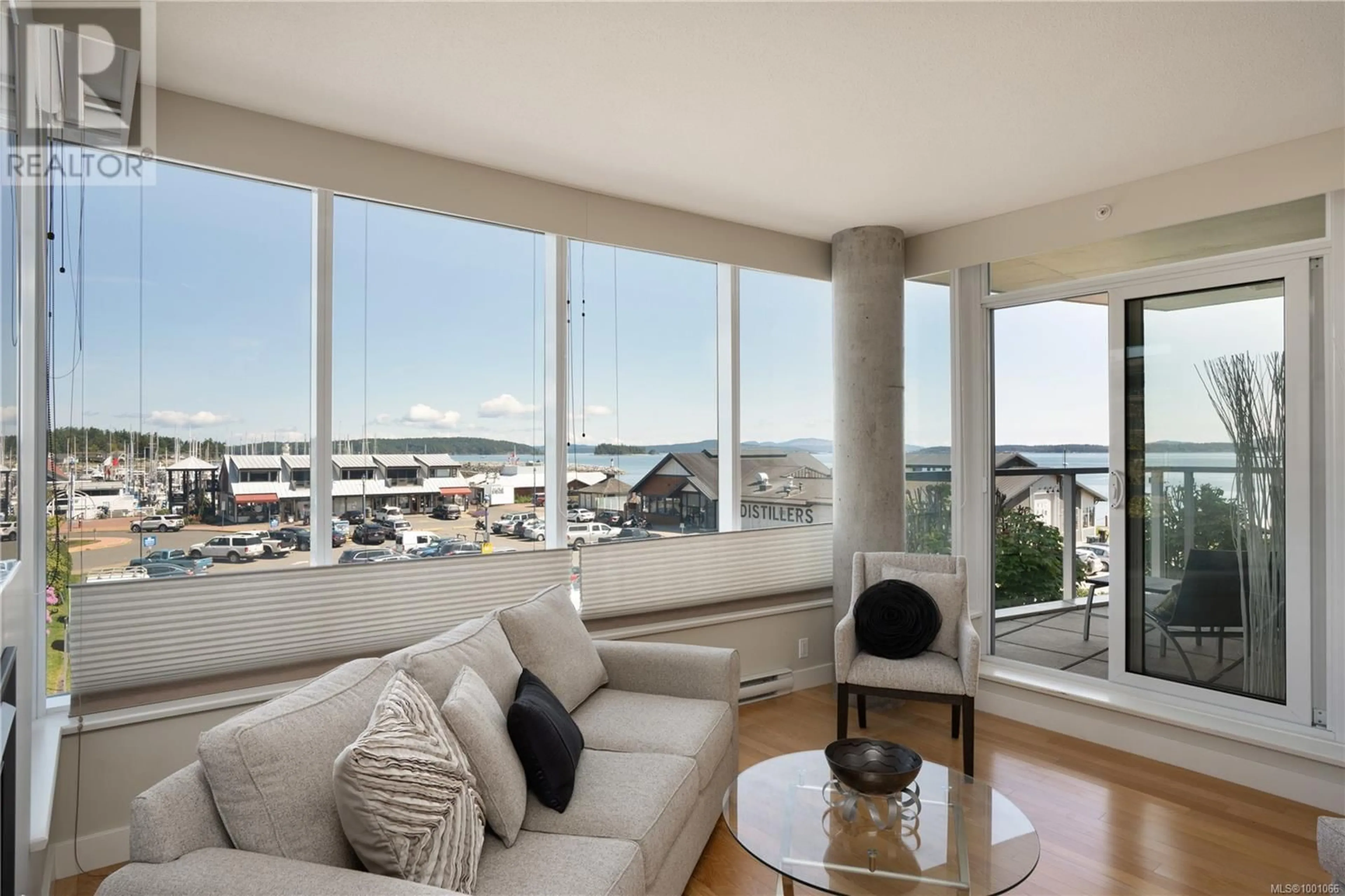 Living room with furniture, unknown for 201 - 9809 SEAPORT PLACE, Sidney British Columbia V8L0A5