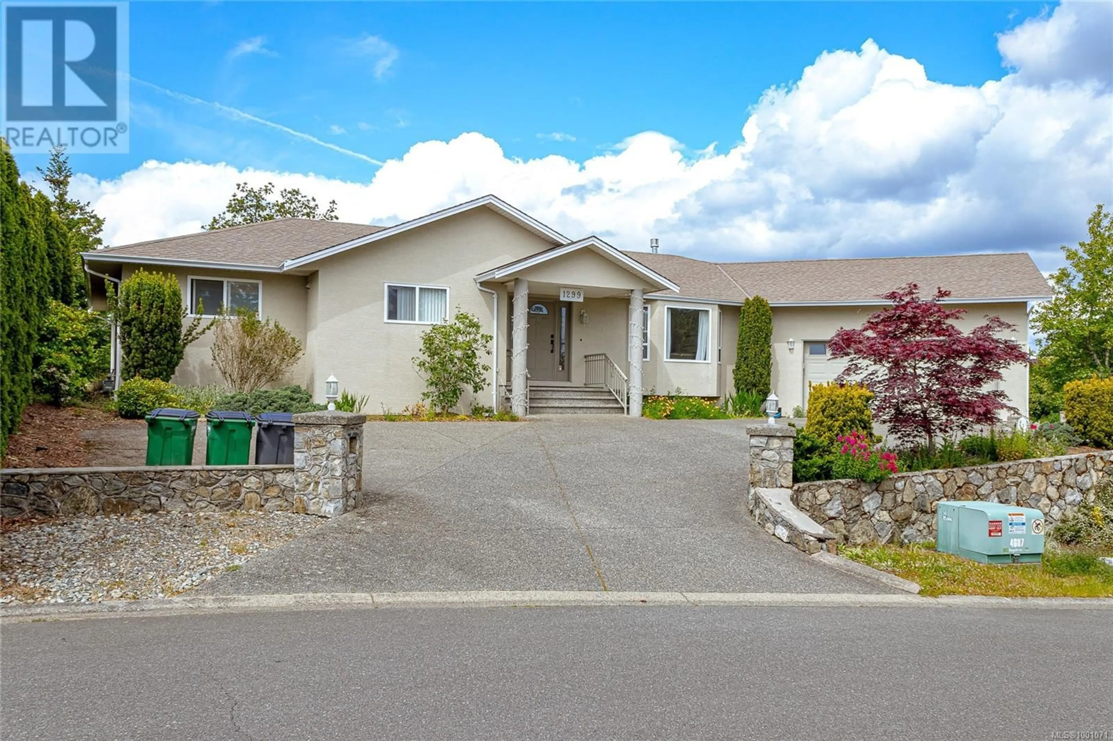 A pic from outside/outdoor area/front of a property/back of a property/a pic from drone, street for 1299 GERIC PLACE, Saanich British Columbia V8Z7L4