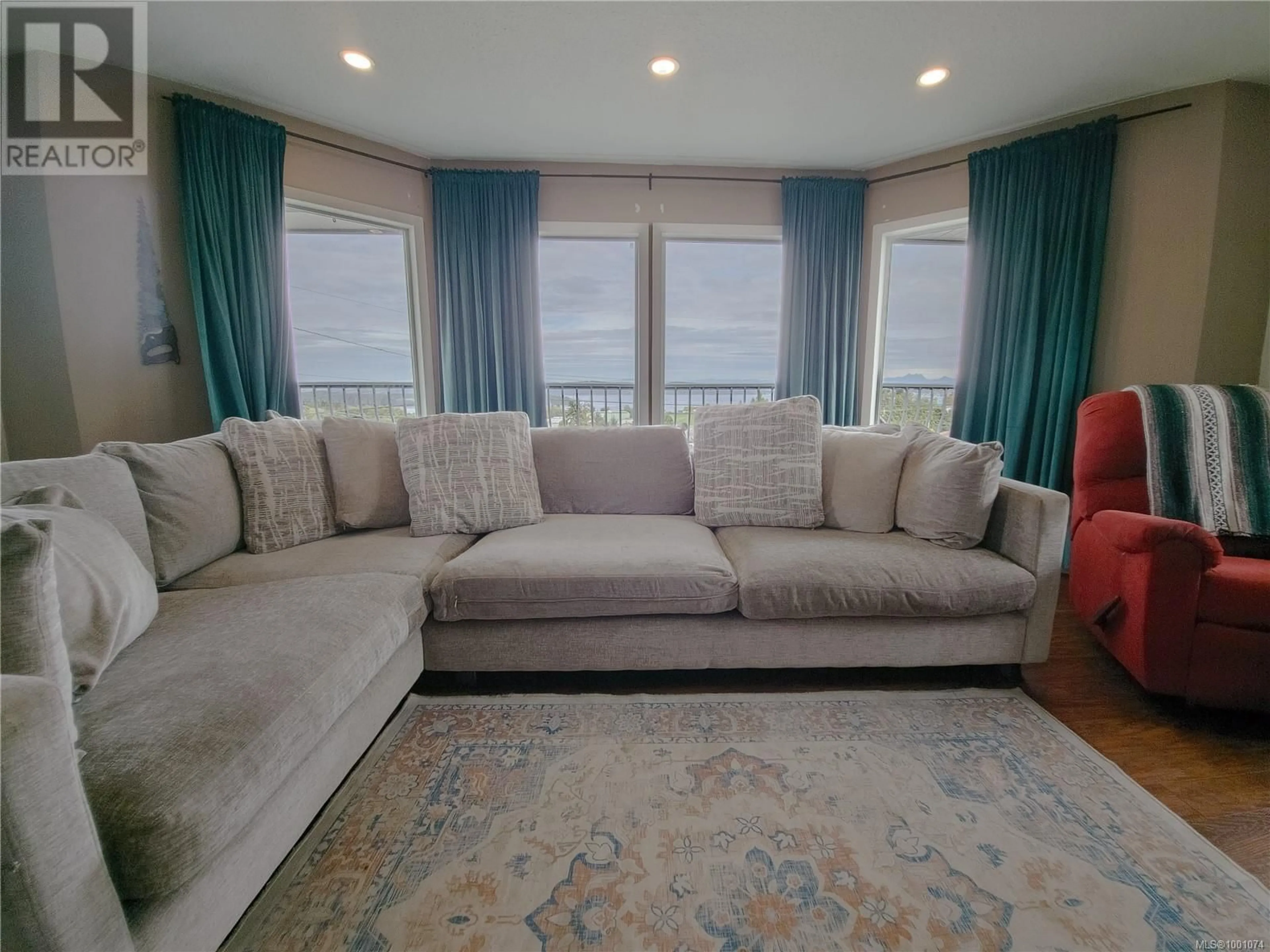 Living room with furniture, carpet floor for 2287 CHELOHSIN CRESCENT, Port McNeill British Columbia V0N2R0