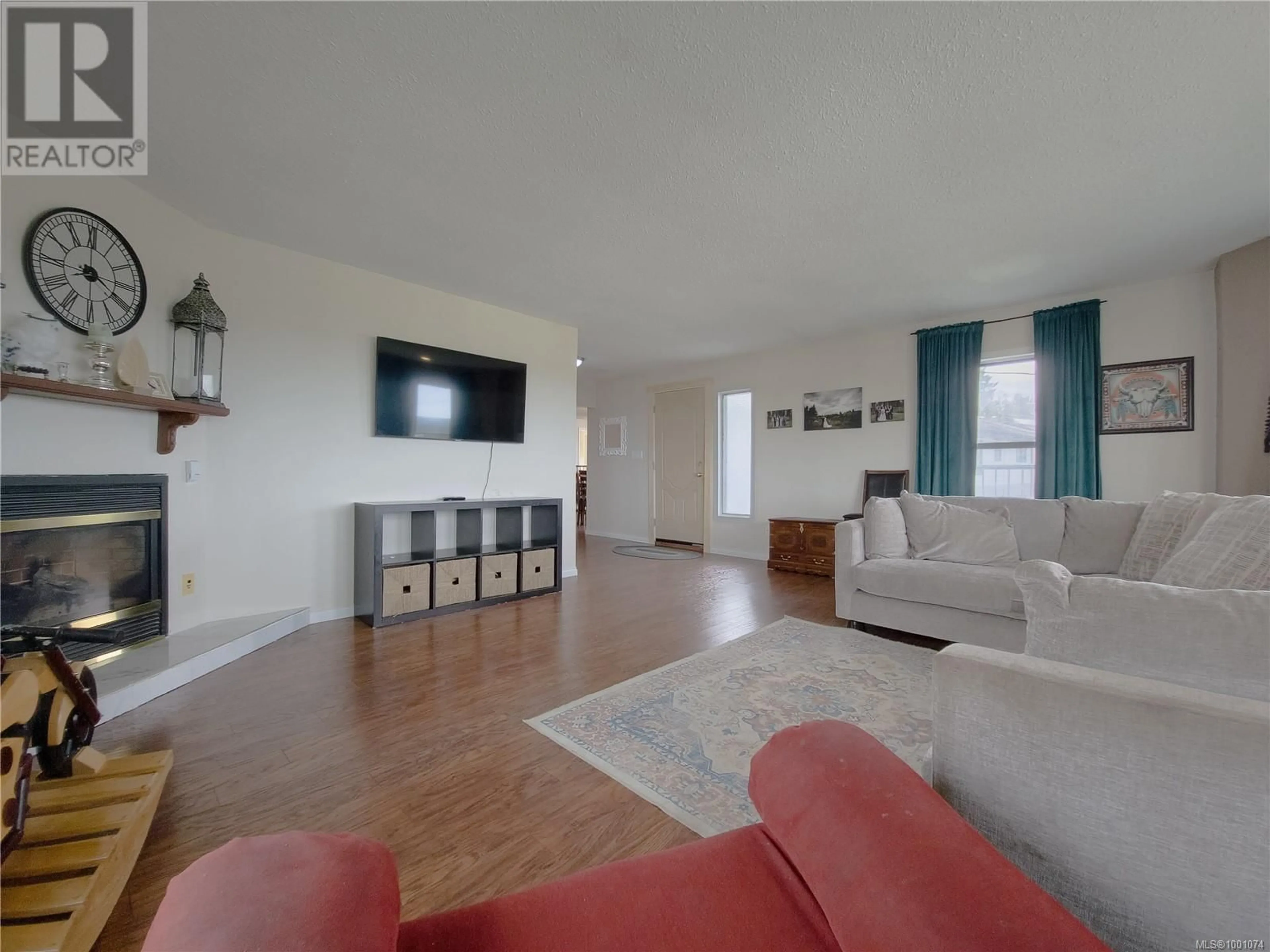Living room with furniture, unknown for 2287 CHELOHSIN CRESCENT, Port McNeill British Columbia V0N2R0