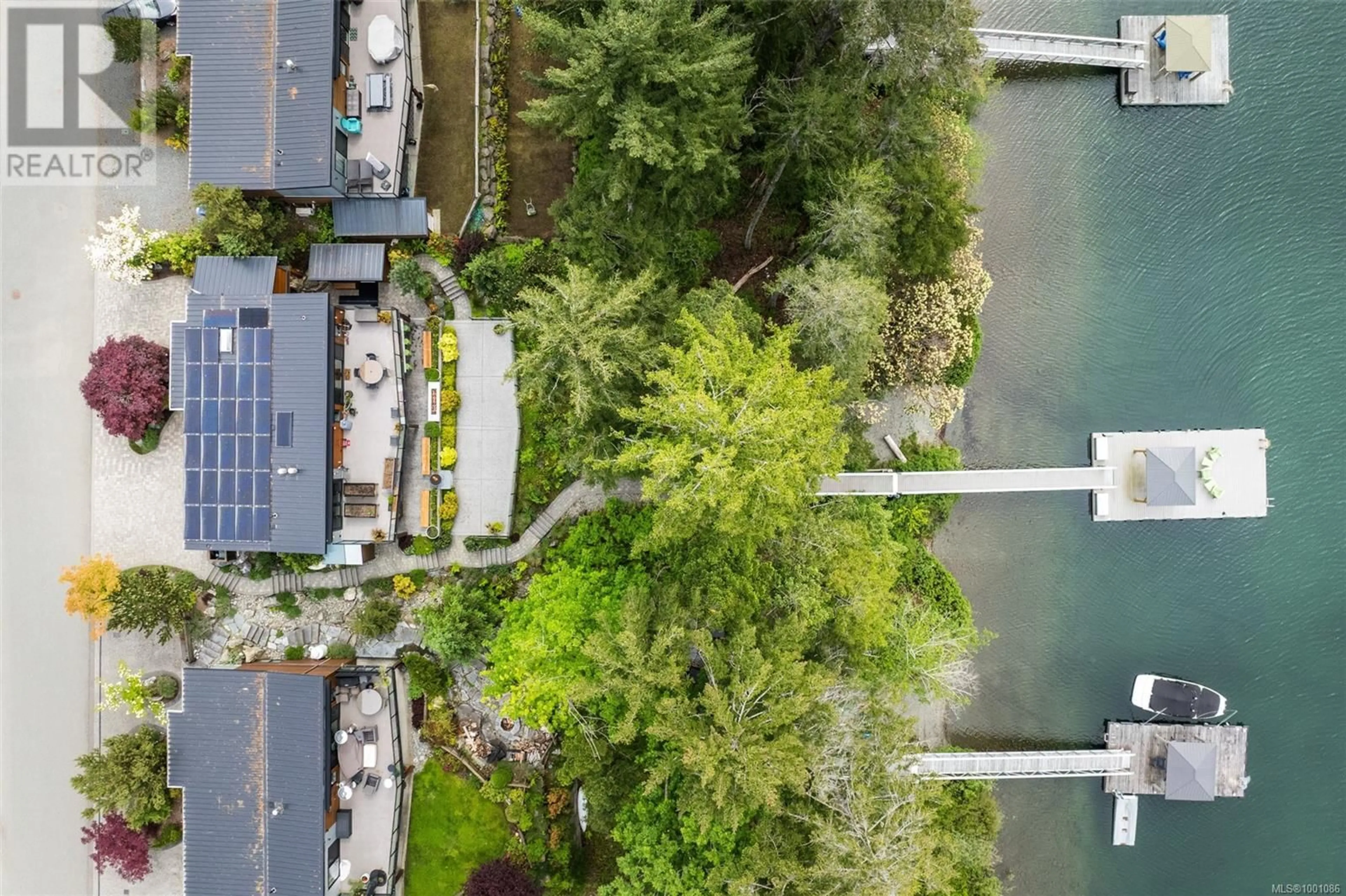 A pic from outside/outdoor area/front of a property/back of a property/a pic from drone, water/lake/river/ocean view for 7424 COTTAGE WAY, Lake Cowichan British Columbia V0R2G1