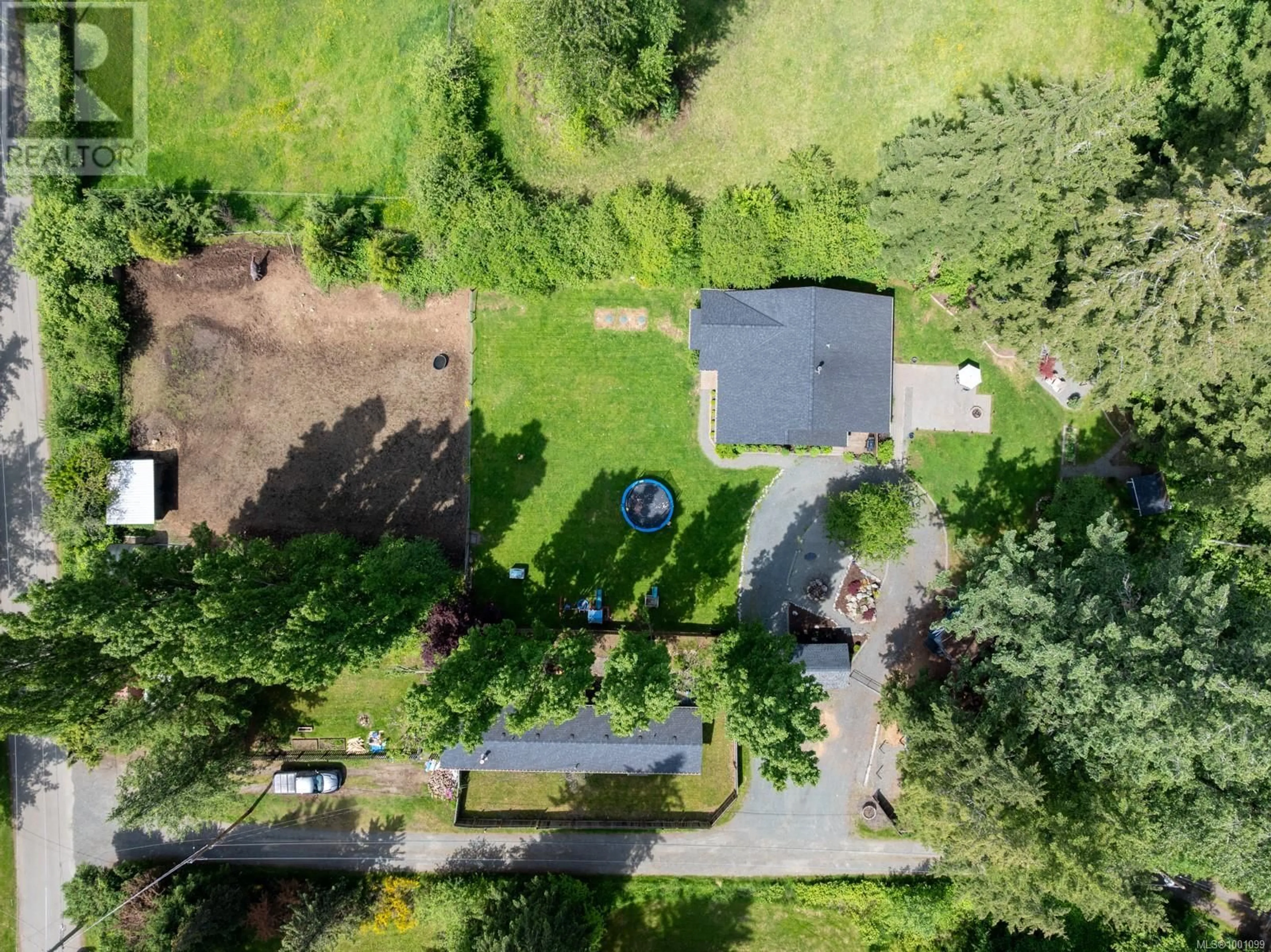 A pic from outside/outdoor area/front of a property/back of a property/a pic from drone, unknown for 6580 POULTON ROAD, Merville British Columbia V0R2M0