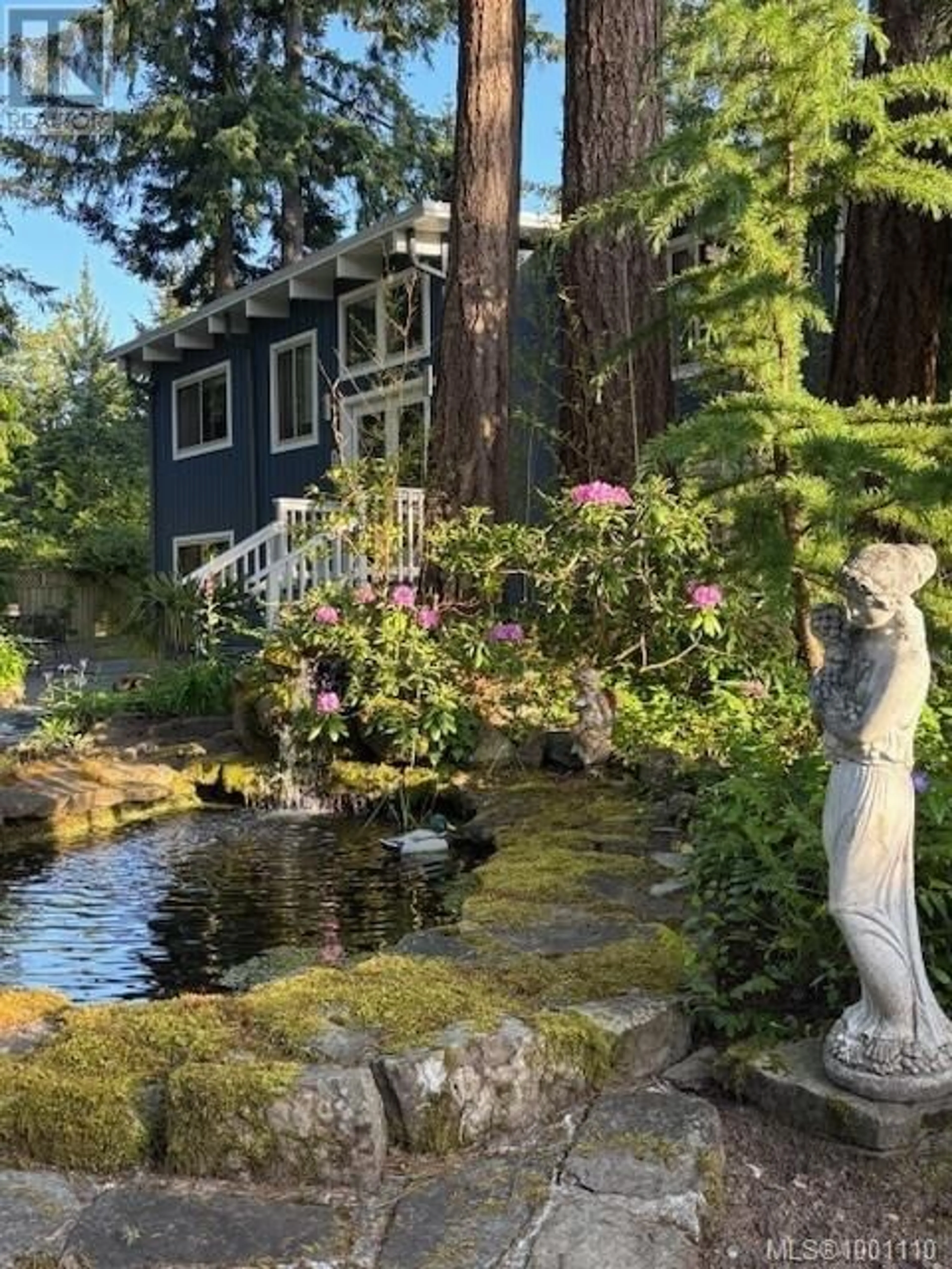 A pic from outside/outdoor area/front of a property/back of a property/a pic from drone, water/lake/river/ocean view for 310 WOODLAND DRIVE, Salt Spring British Columbia V8K1J6