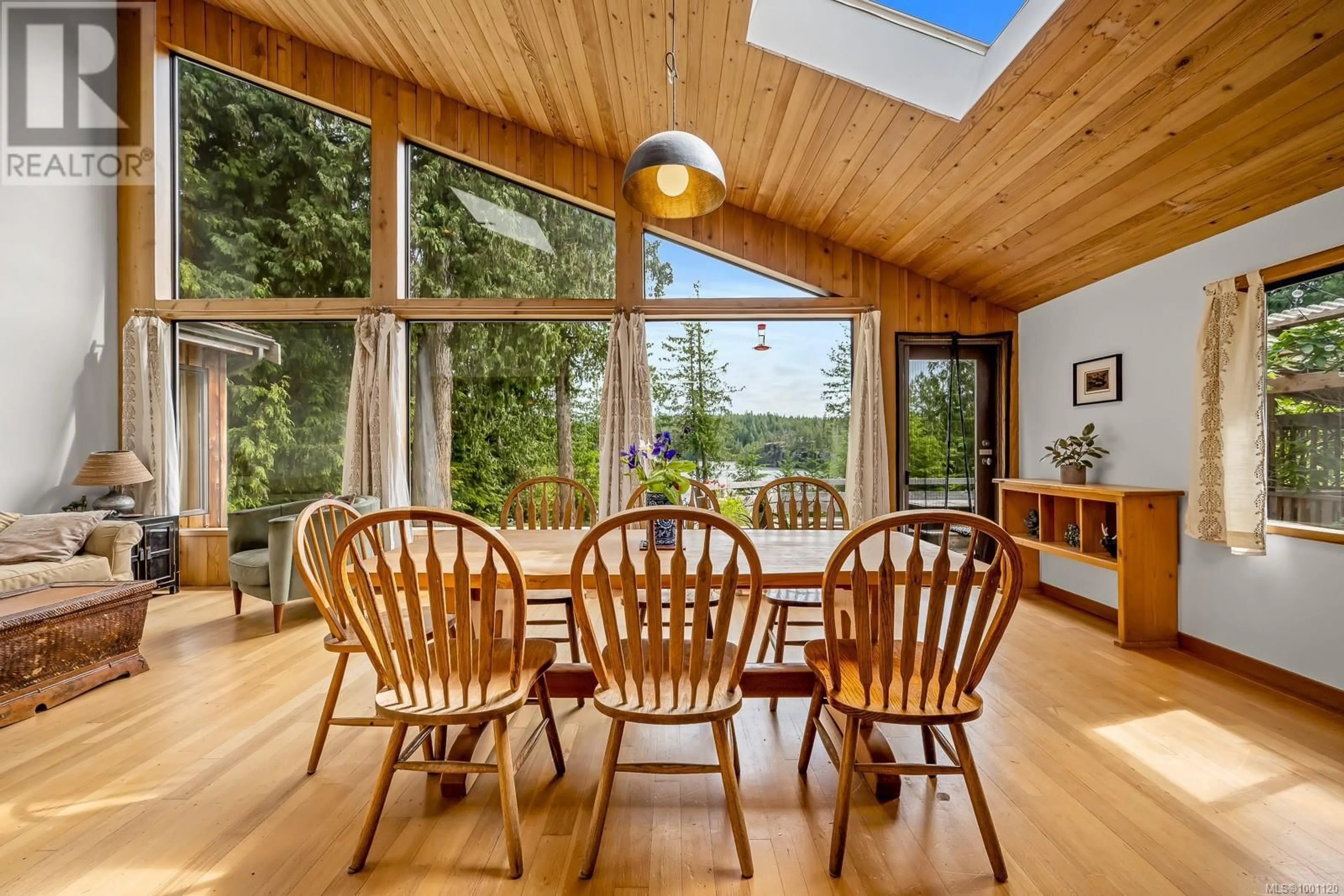 Dining room, wood/laminate floor for 822 AUSTIN DRIVE, Cortes Island British Columbia V0P1K0
