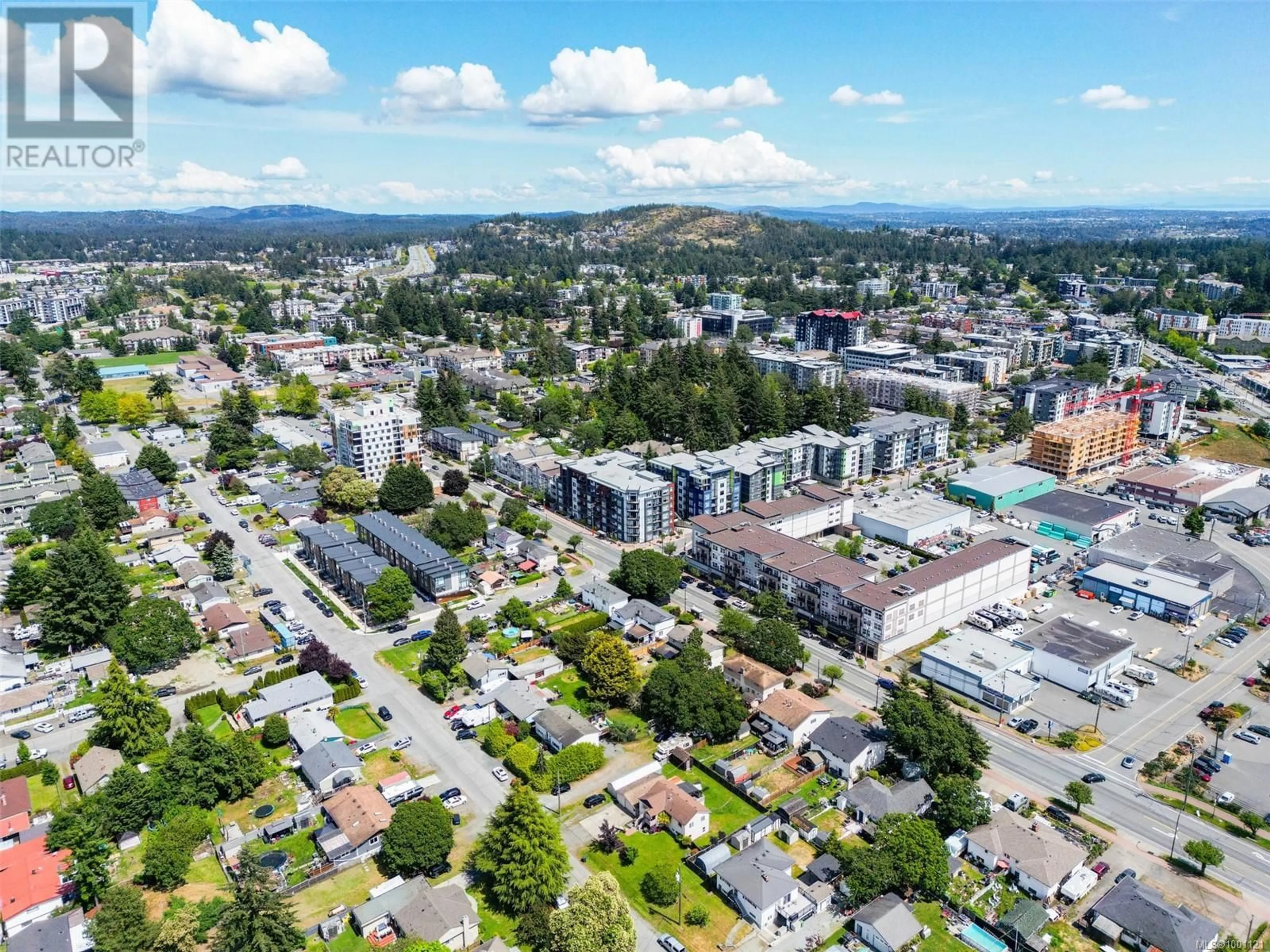 A pic from outside/outdoor area/front of a property/back of a property/a pic from drone, mountain view for 607 - 2843 JACKLIN ROAD, Langford British Columbia V9B3X9