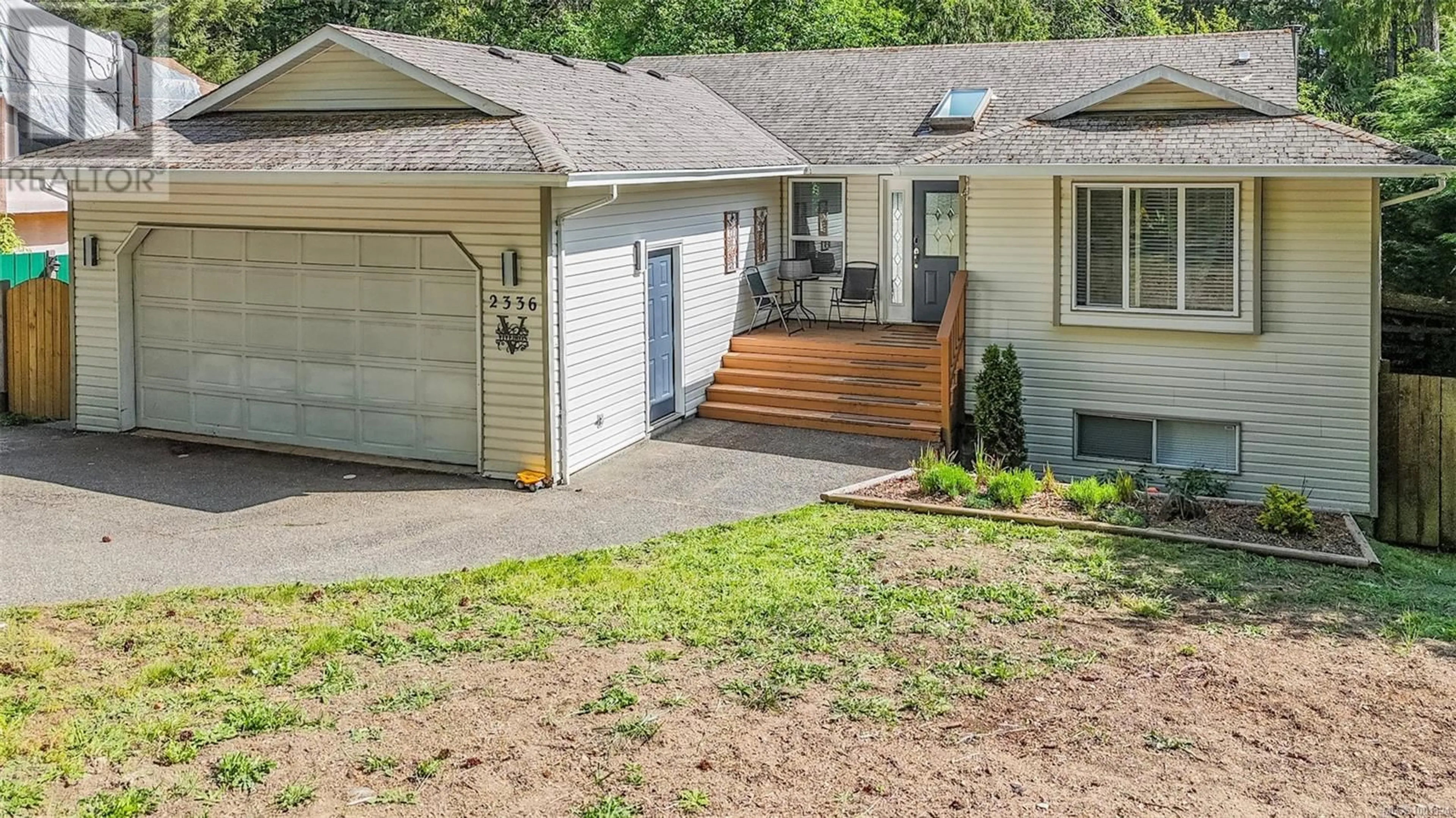 A pic from outside/outdoor area/front of a property/back of a property/a pic from drone, street for 2336 RAVENHILL ROAD, Shawnigan Lake British Columbia V0R2W1