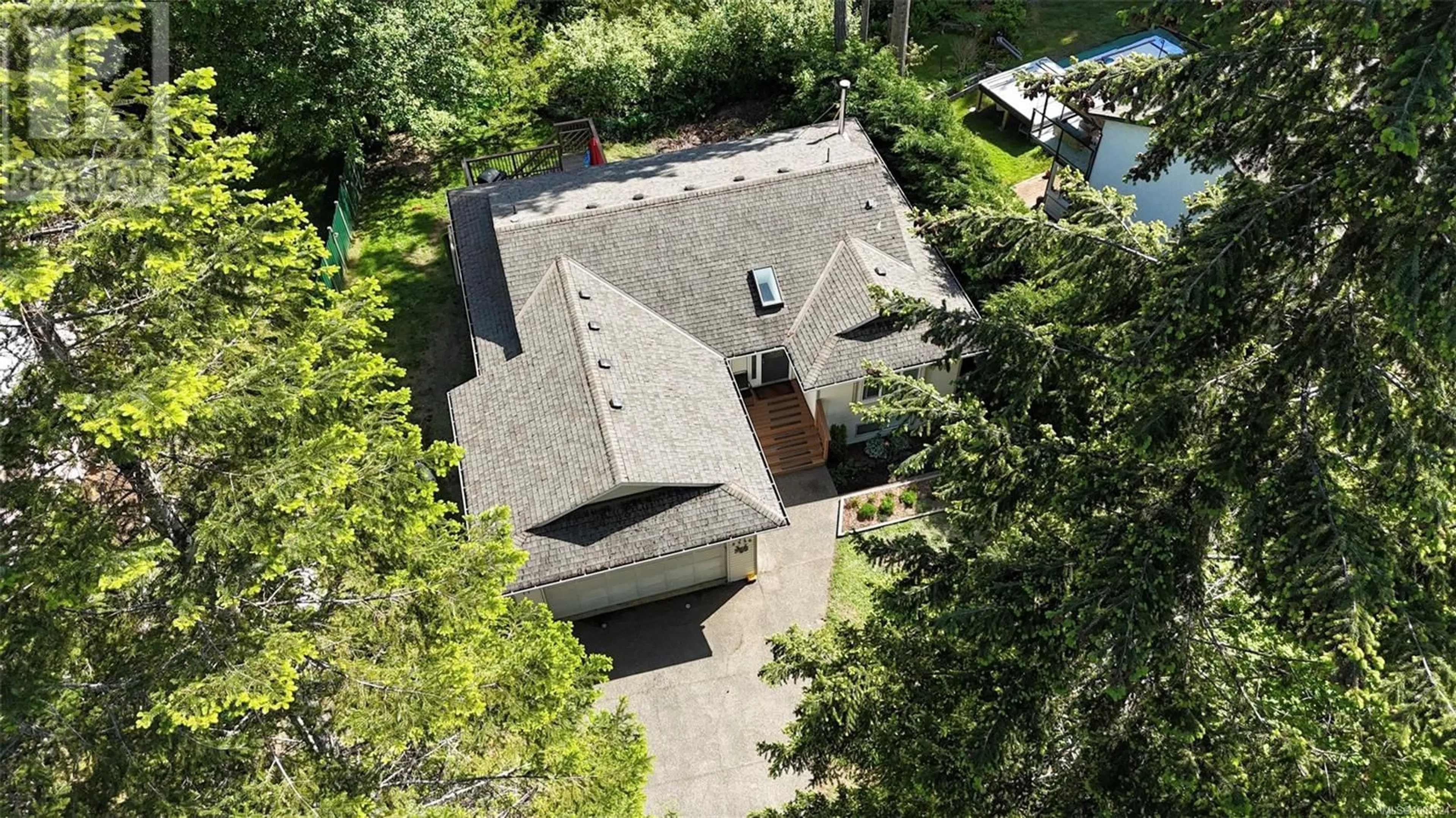 A pic from outside/outdoor area/front of a property/back of a property/a pic from drone, street for 2336 RAVENHILL ROAD, Shawnigan Lake British Columbia V0R2W1