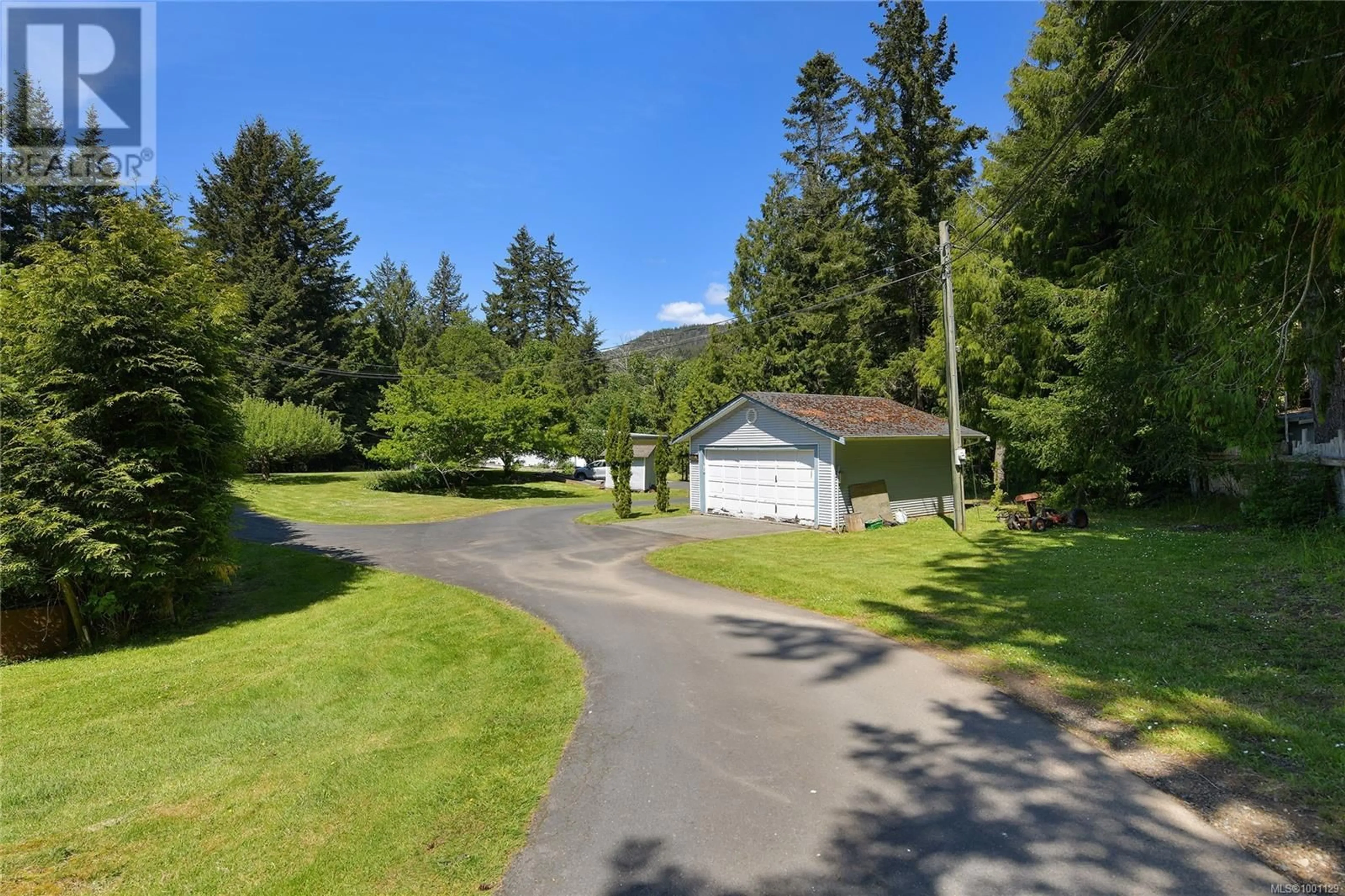 A pic from outside/outdoor area/front of a property/back of a property/a pic from drone, mountain view for 6790 PASCOE ROAD, Sooke British Columbia V9Z0J3