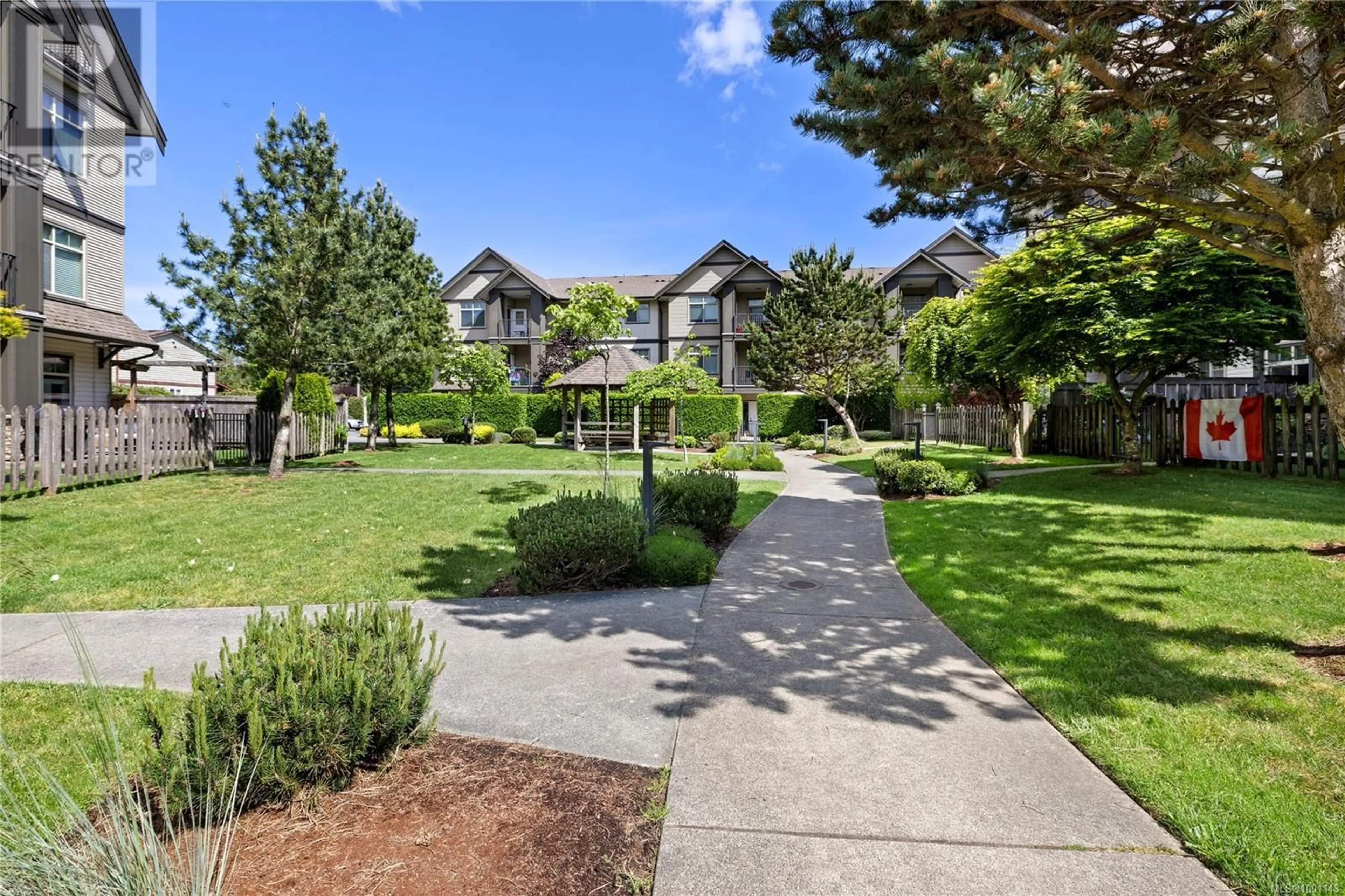 A pic from outside/outdoor area/front of a property/back of a property/a pic from drone, street for 104 - 2117 MEREDITH ROAD, Nanaimo British Columbia V9S2N2