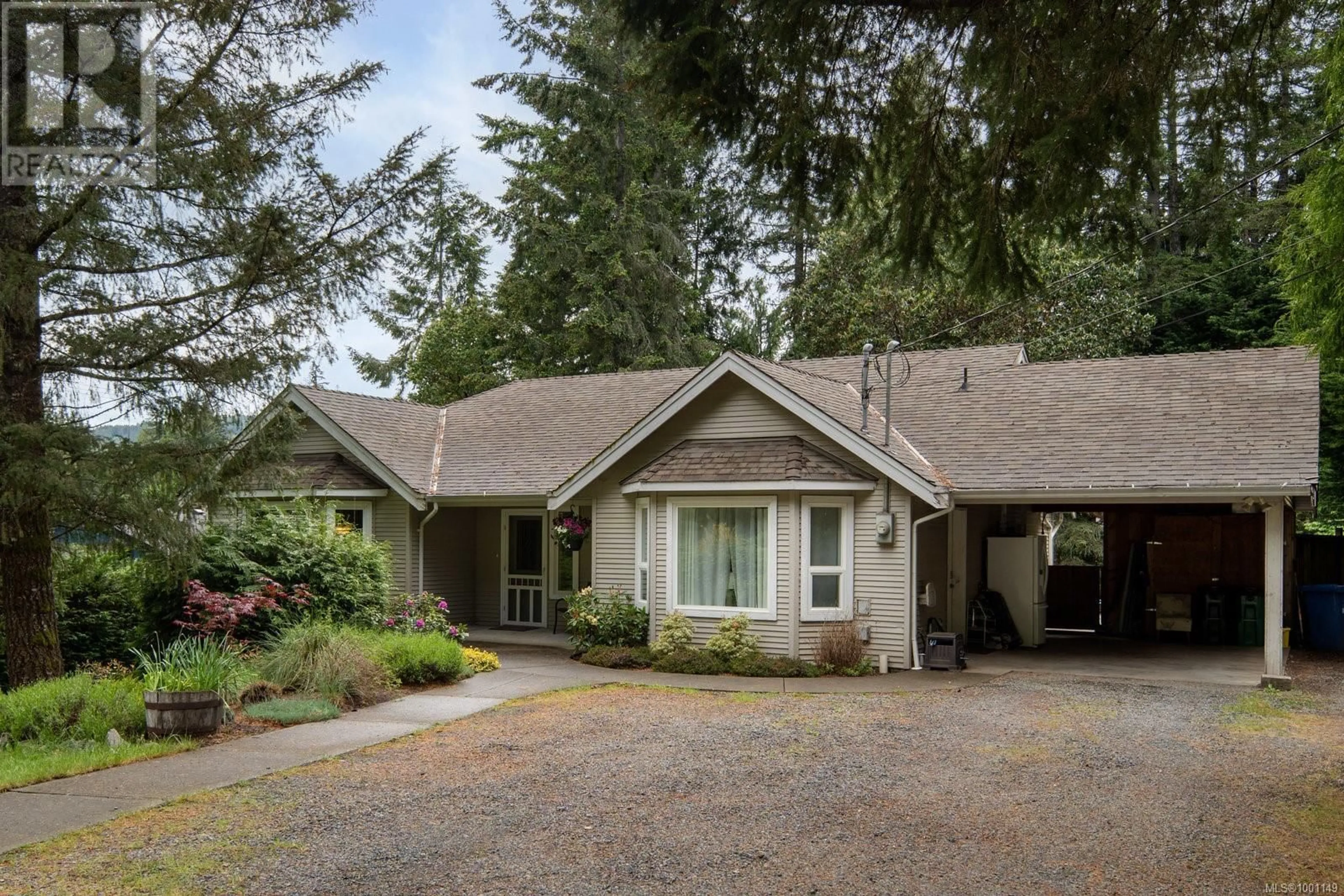 Home with vinyl exterior material, street for 2750 SCOBHAL ROAD, Shawnigan Lake British Columbia V0R2W1