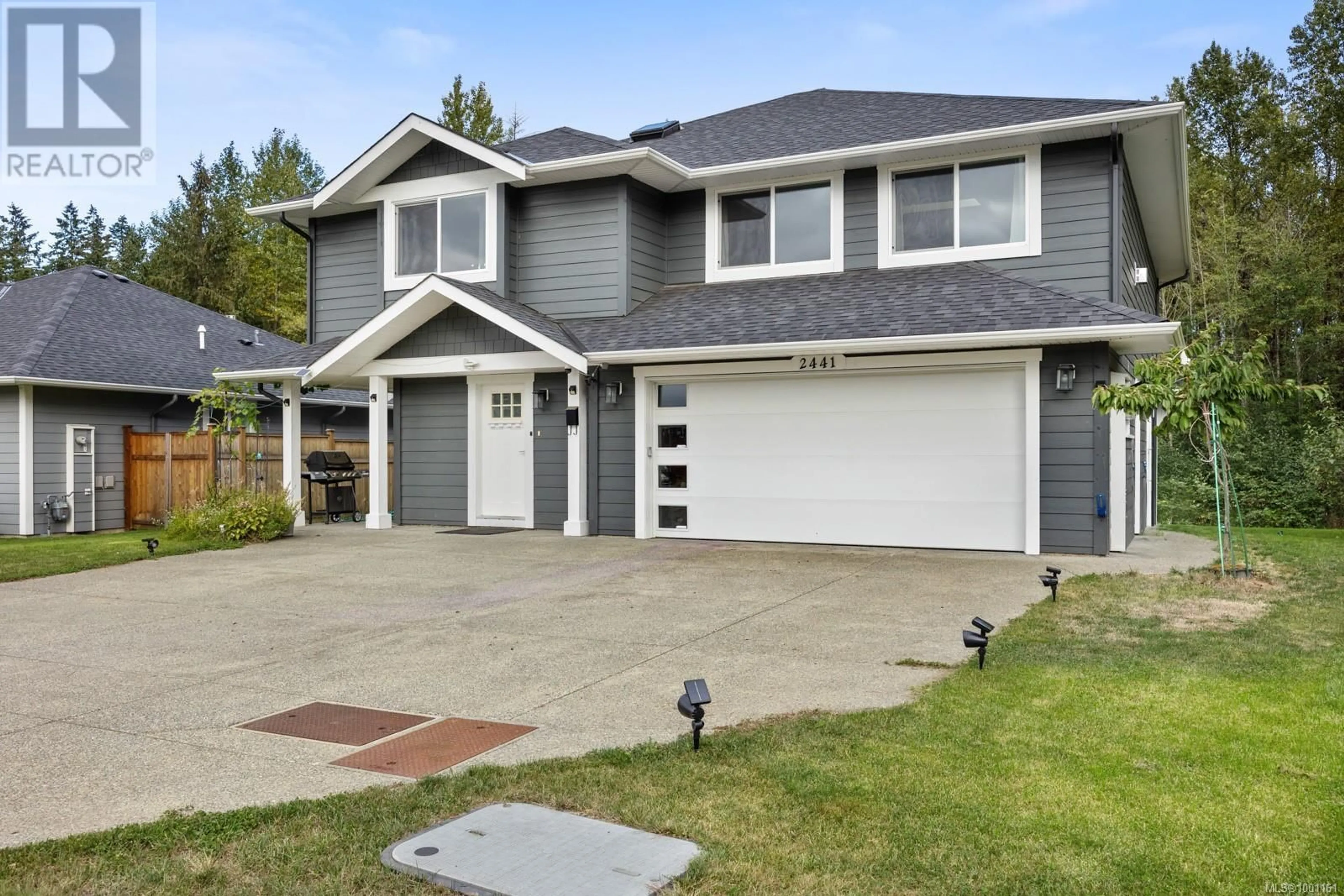 Home with vinyl exterior material, street for 2441 BROOKFIELD DRIVE, Courtenay British Columbia V9N0E6