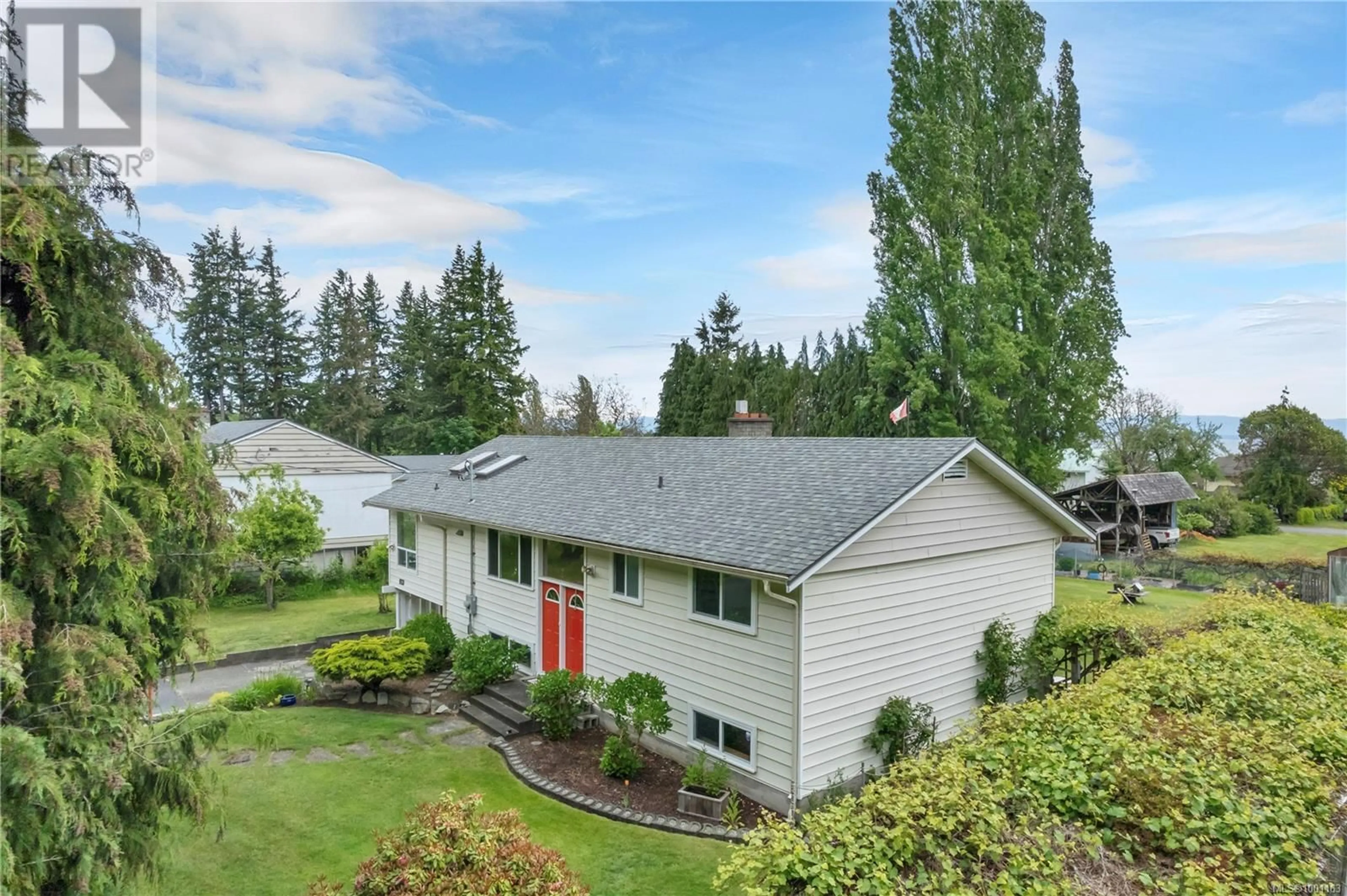 A pic from outside/outdoor area/front of a property/back of a property/a pic from drone, mountain view for 3974 JACK ROAD, Campbell River British Columbia V9H1H1