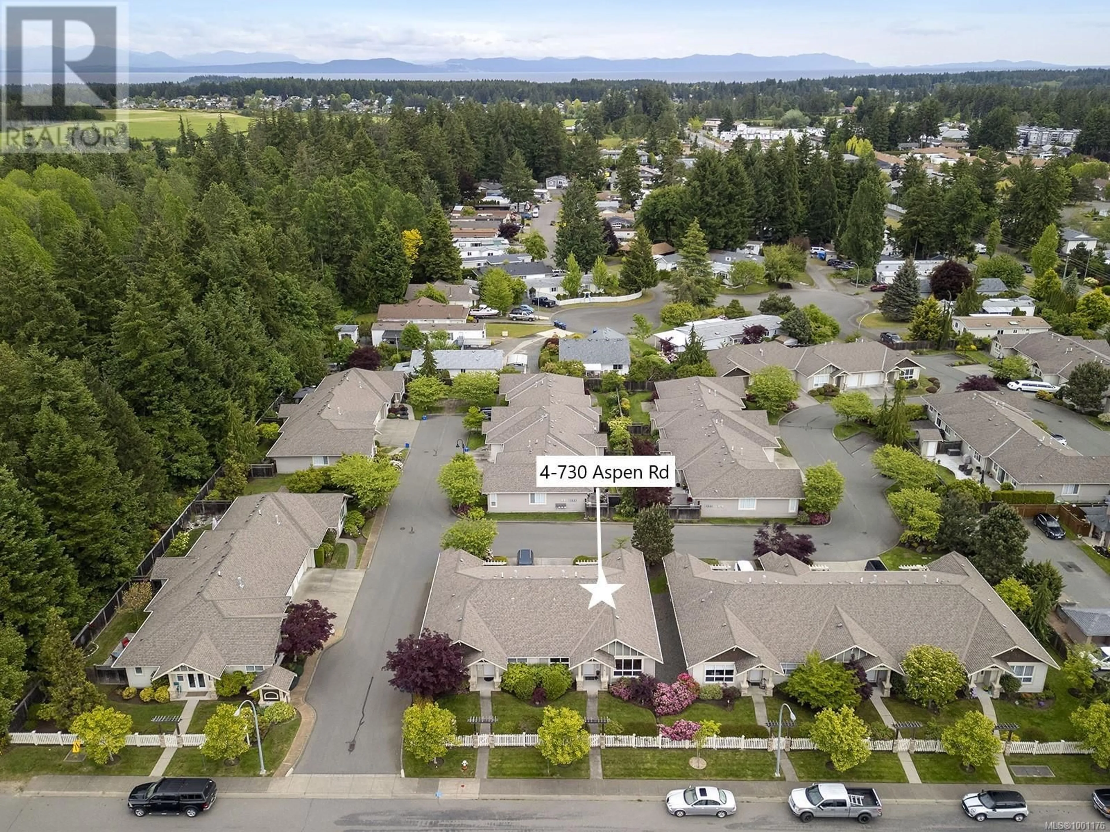 A pic from outside/outdoor area/front of a property/back of a property/a pic from drone, unknown for 4 - 730 ASPEN ROAD, Comox British Columbia V9M0A4