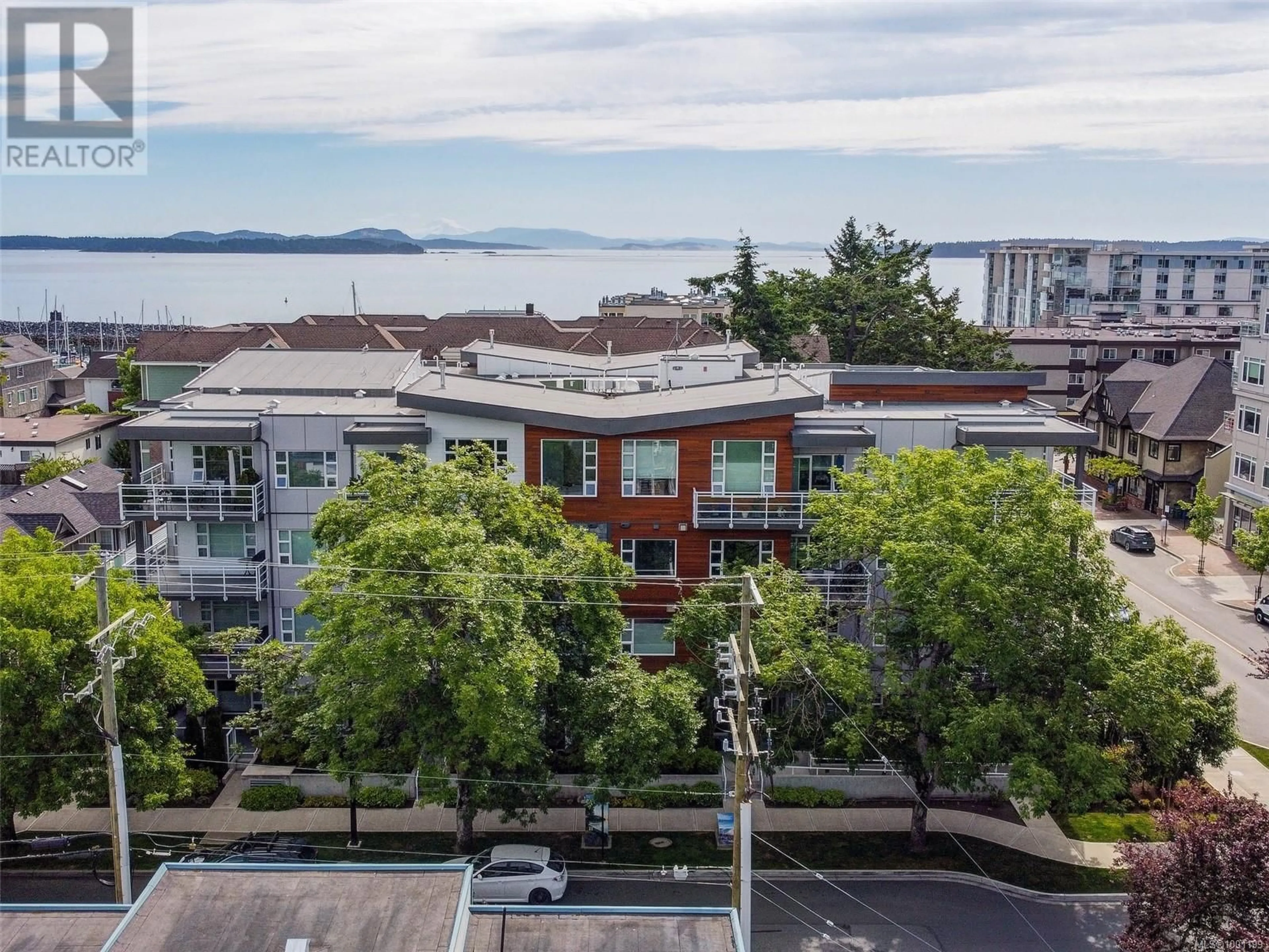 A pic from outside/outdoor area/front of a property/back of a property/a pic from drone, city buildings view from balcony for 206 - 9861 THIRD STREET, Sidney British Columbia V8L3A8