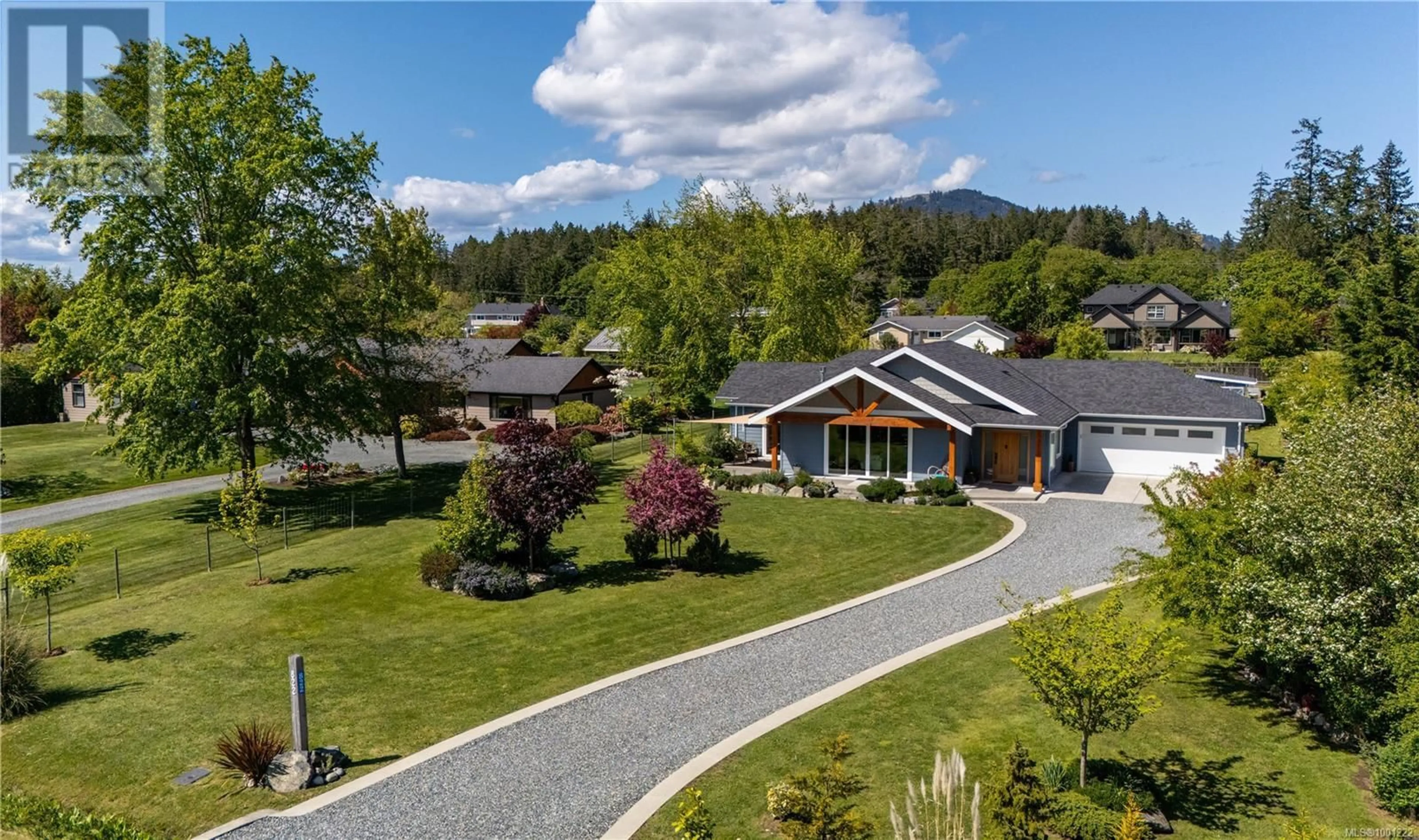 A pic from outside/outdoor area/front of a property/back of a property/a pic from drone, mountain view for 822 WAIN ROAD, North Saanich British Columbia V8L5N8