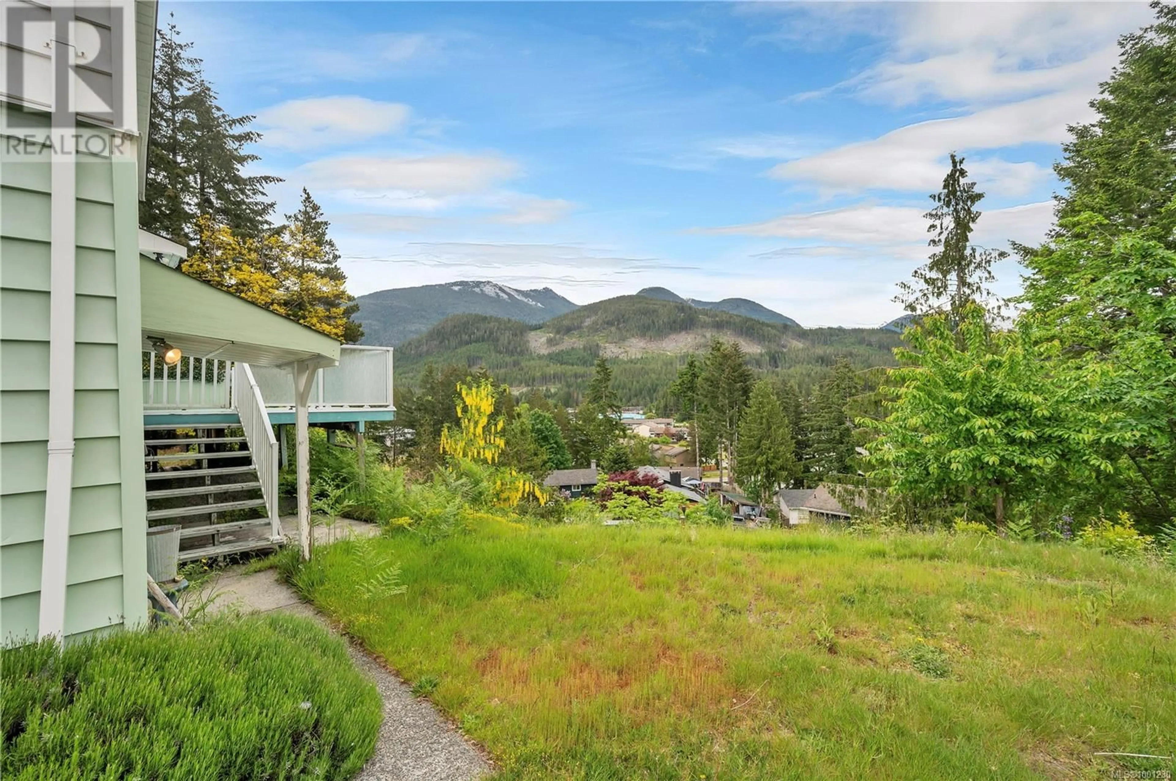 A pic from outside/outdoor area/front of a property/back of a property/a pic from drone, mountain view for 547 MALLARD WAY, Gold River British Columbia V0P1G0